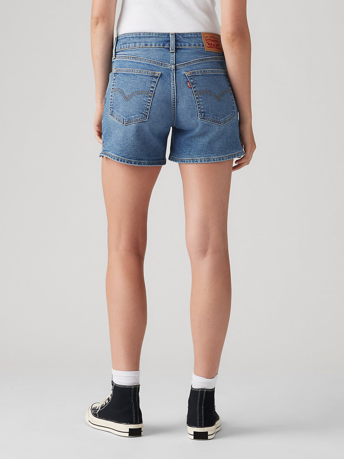 Back view of Levi’s A-Line No You Didn’t Denim Short in medium blue by Levi Strauss & Co with classic pockets.