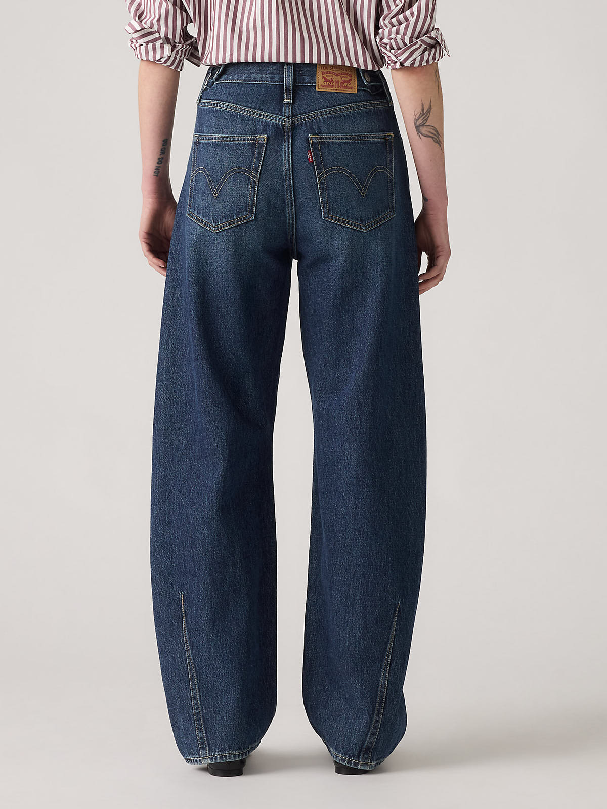 Back view of Levi’s Cinch Barrel New Shades Denim Jeans in dark blue by Levi Strauss & Co with wide leg fit.