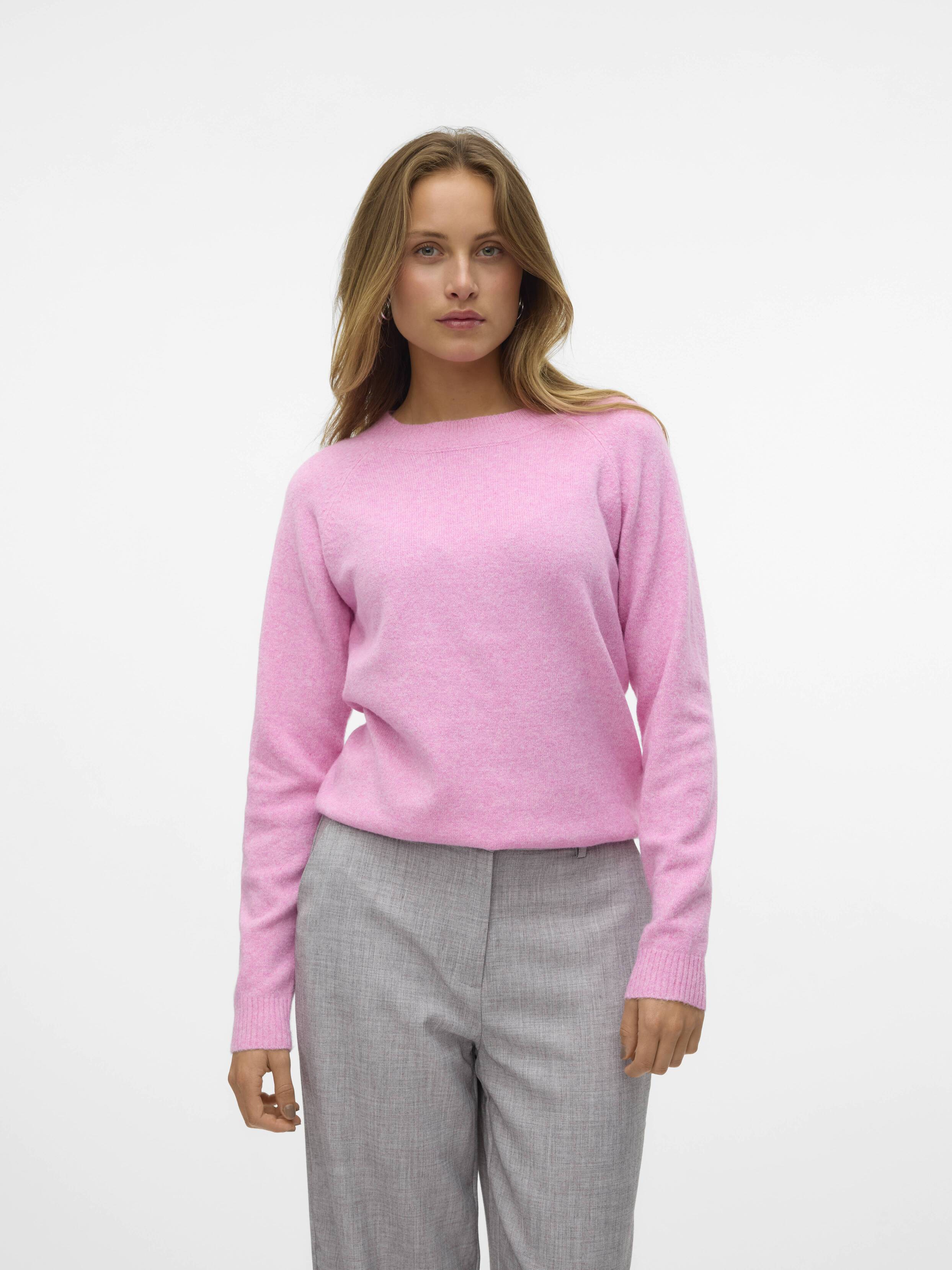 Vero Moda Softy Crew Neck Lightweight Sweater in soft pink, styled with gray trousers, elegant and cozy knitwear top