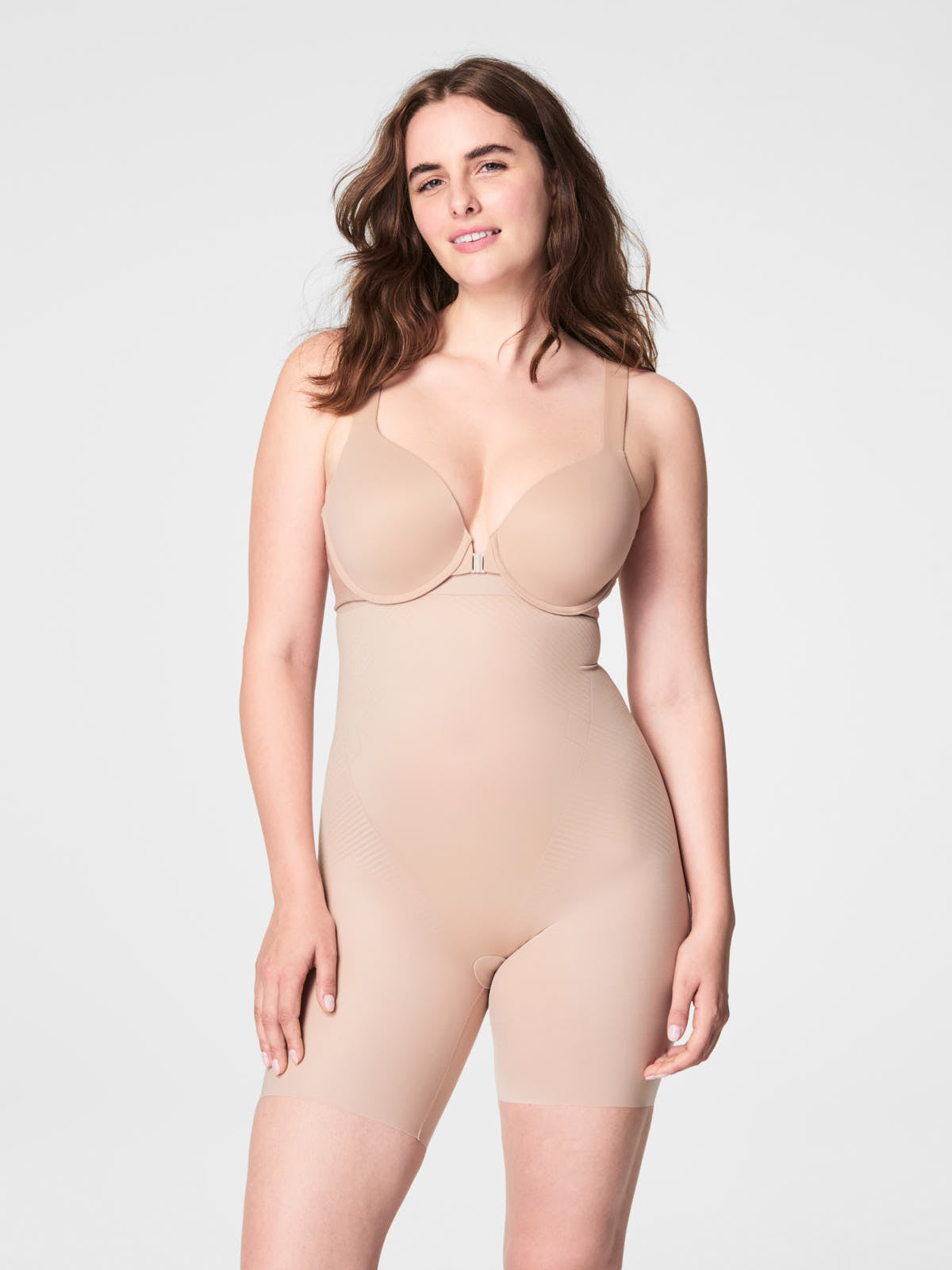 SPAX Thinstincts® 2.0 High-Waist Mid-Thigh Shorts by Spanx in beige shapewear for smooth silhouette.
