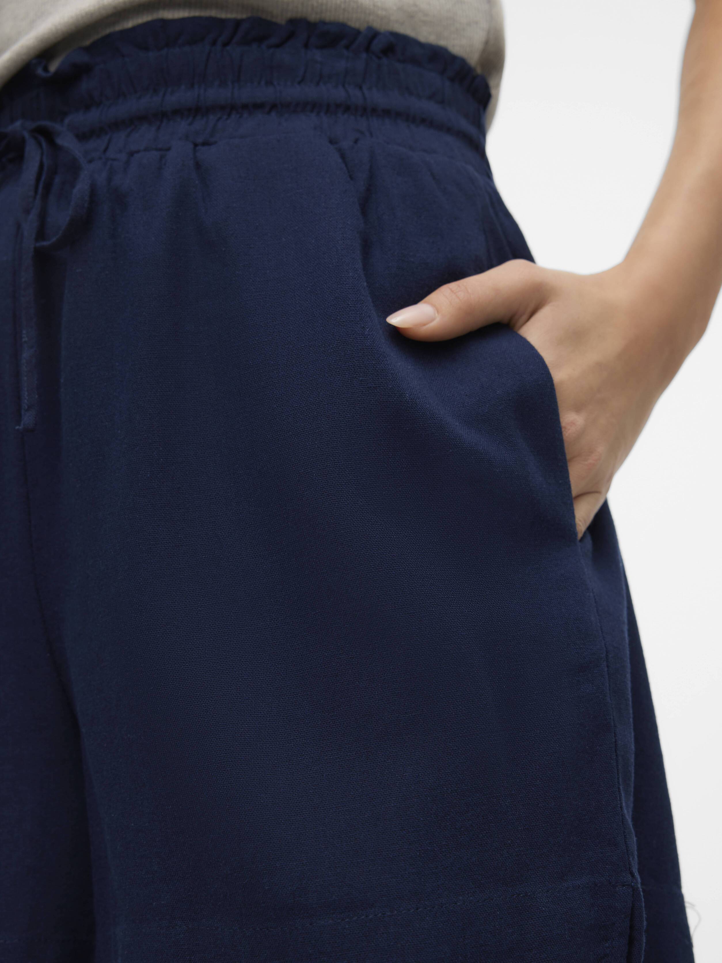 Close-up of navy Vero Moda My Nen Poplin Pull-On Shorts with elastic waistband and side pocket detail.
