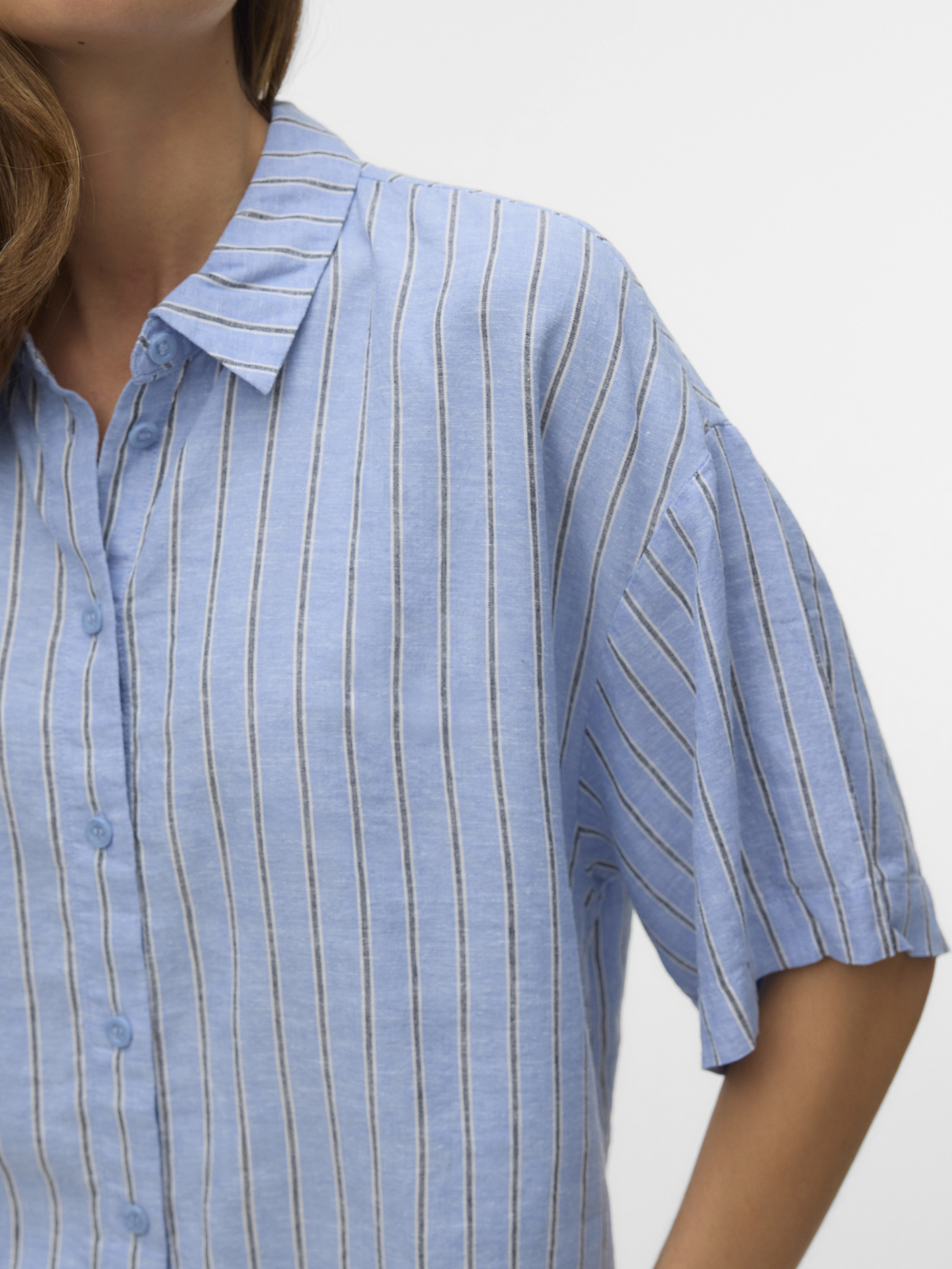 Light blue short-sleeve button-up shirt with vertical white and navy stripes and a classic collar
