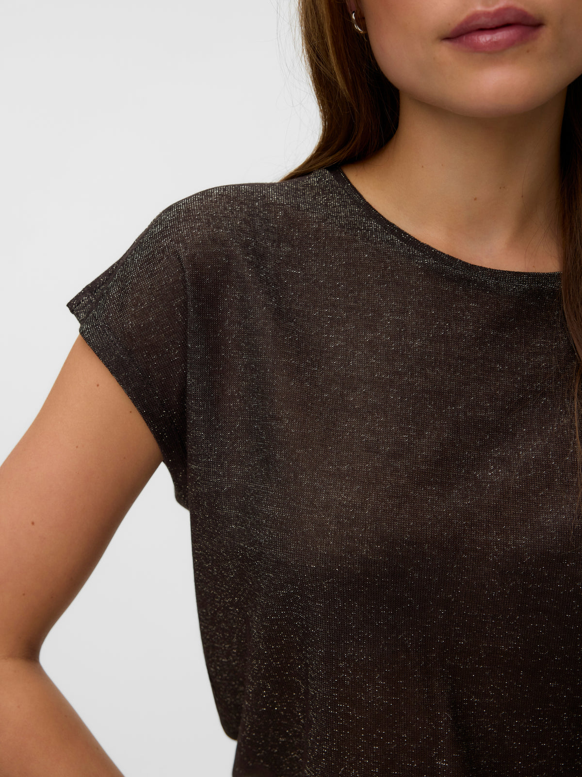 Close up of a dark brown short sleeve top with a round neckline