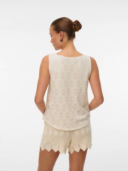 Back view of beige Vero Moda Mayet Sleeveless Top with textured pattern styled with matching shorts