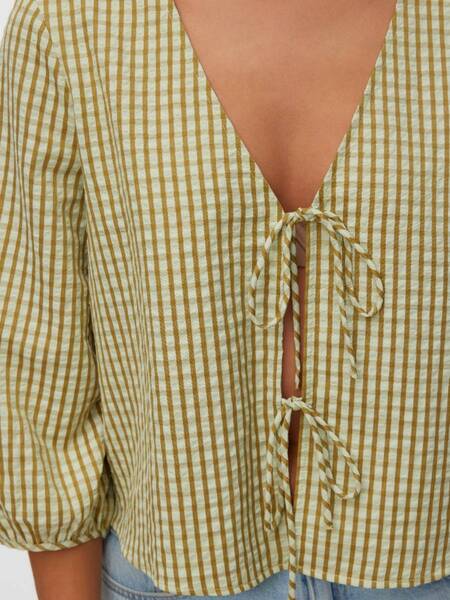 Vero Moda Came Fitted Sleeveless Top in green and white check pattern with front tie details and textured fabric design