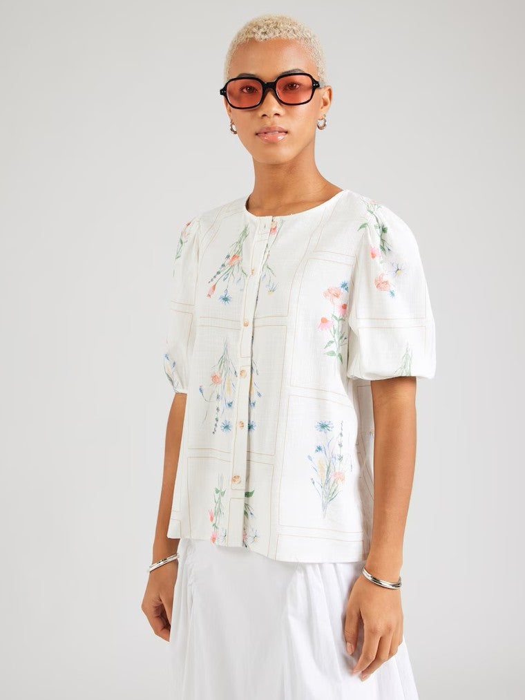 Vero Moda Jamie Flower Short Sleeve Button Top in white with floral pattern, short puff sleeves, and button front closure