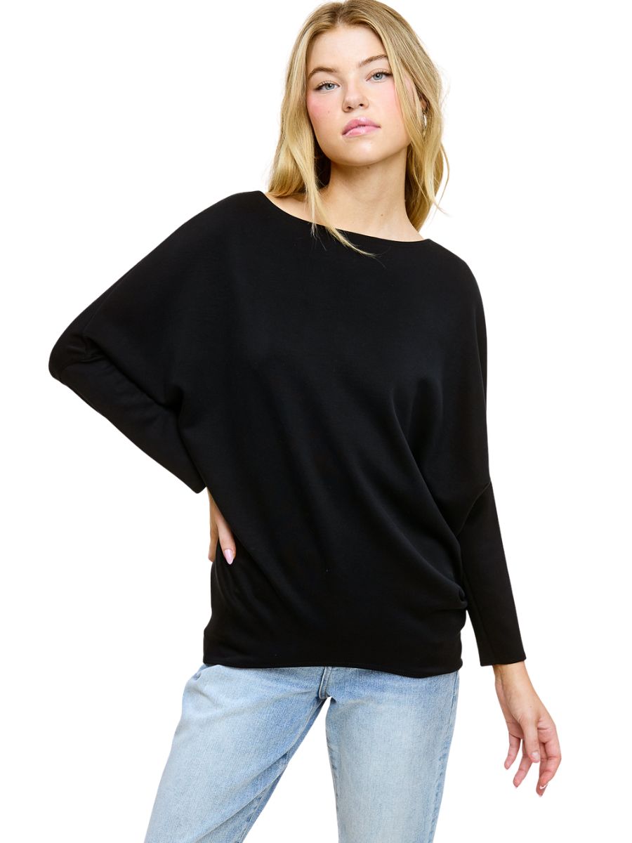 Black long-sleeve Julie Modal Dolman Top by Jolie Inc., paired with light blue denim jeans on model.