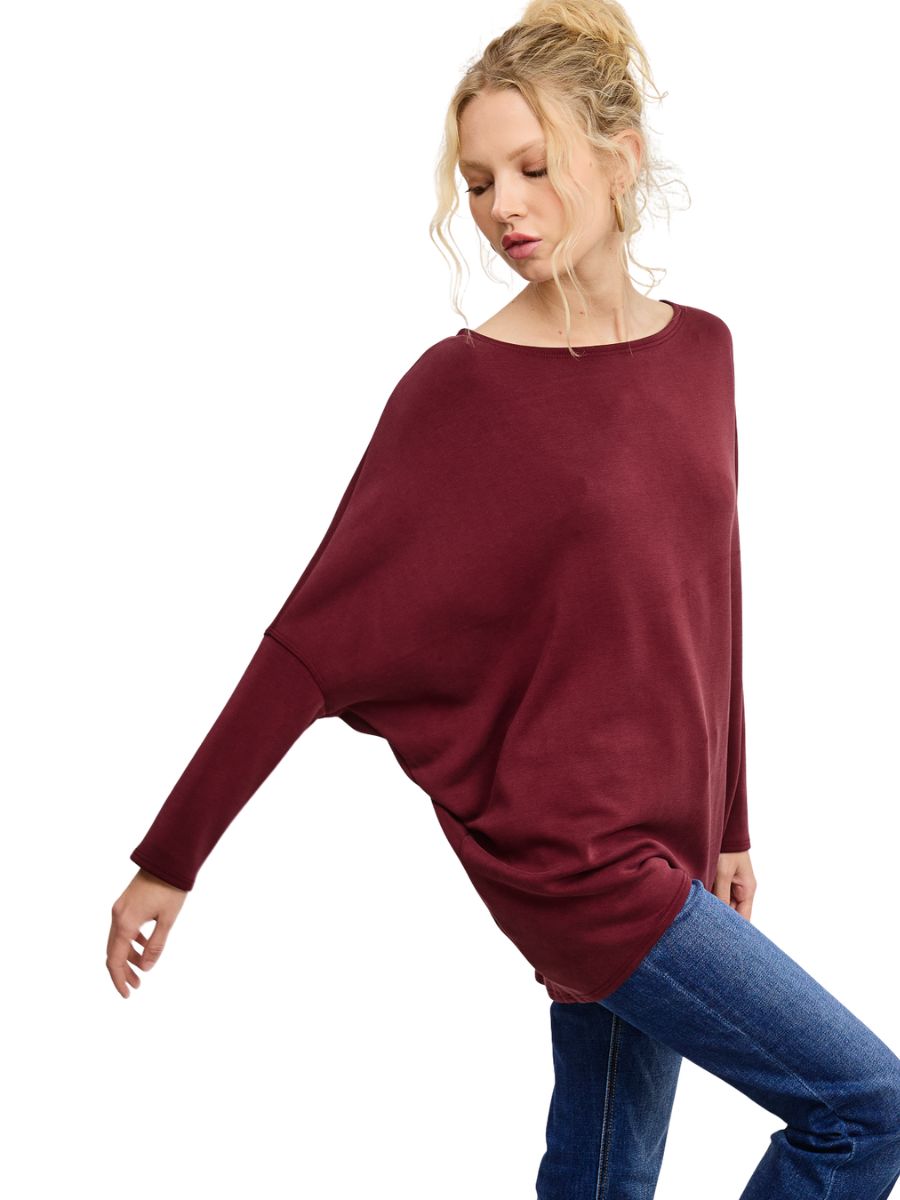 Casual burgundy Julie Modal Dolman Top by Jolie Inc. styled with blue denim jeans in a relaxed fit look.