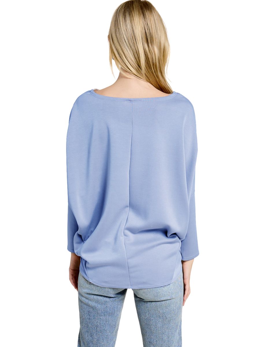 Light blue Julie Modal Dolman Top by Jolie Inc. shown from the back, styled with casual denim jeans.