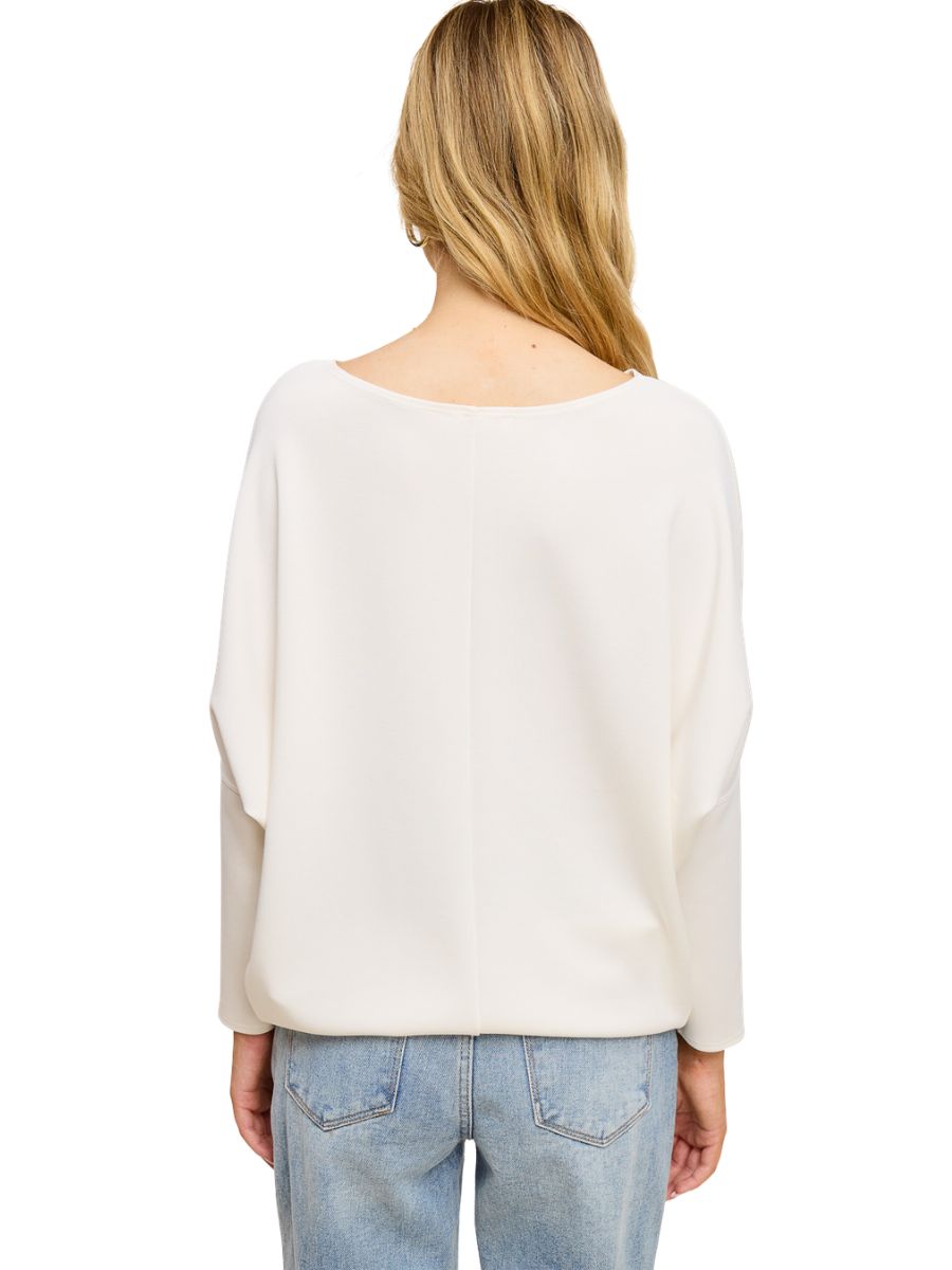 Off-white Julie Modal Dolman Top from Jolie Inc. shown from the back with a relaxed, draped fit and light fabric.