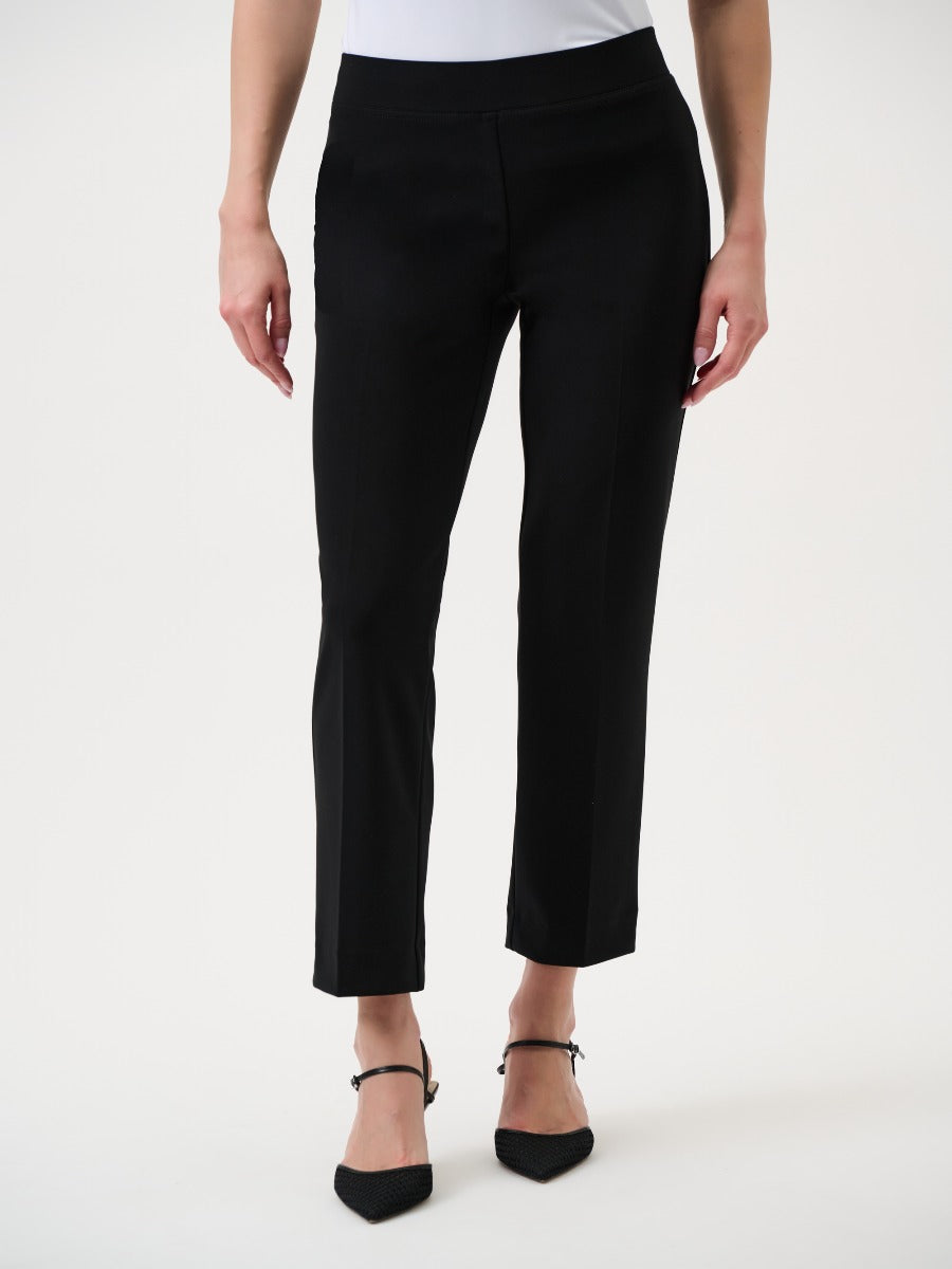 Joseph Ribkoff 29" Silky Knit Pant in black, slim fit with clean lines, paired with black pointed shoes by Joseph Ribkoff.