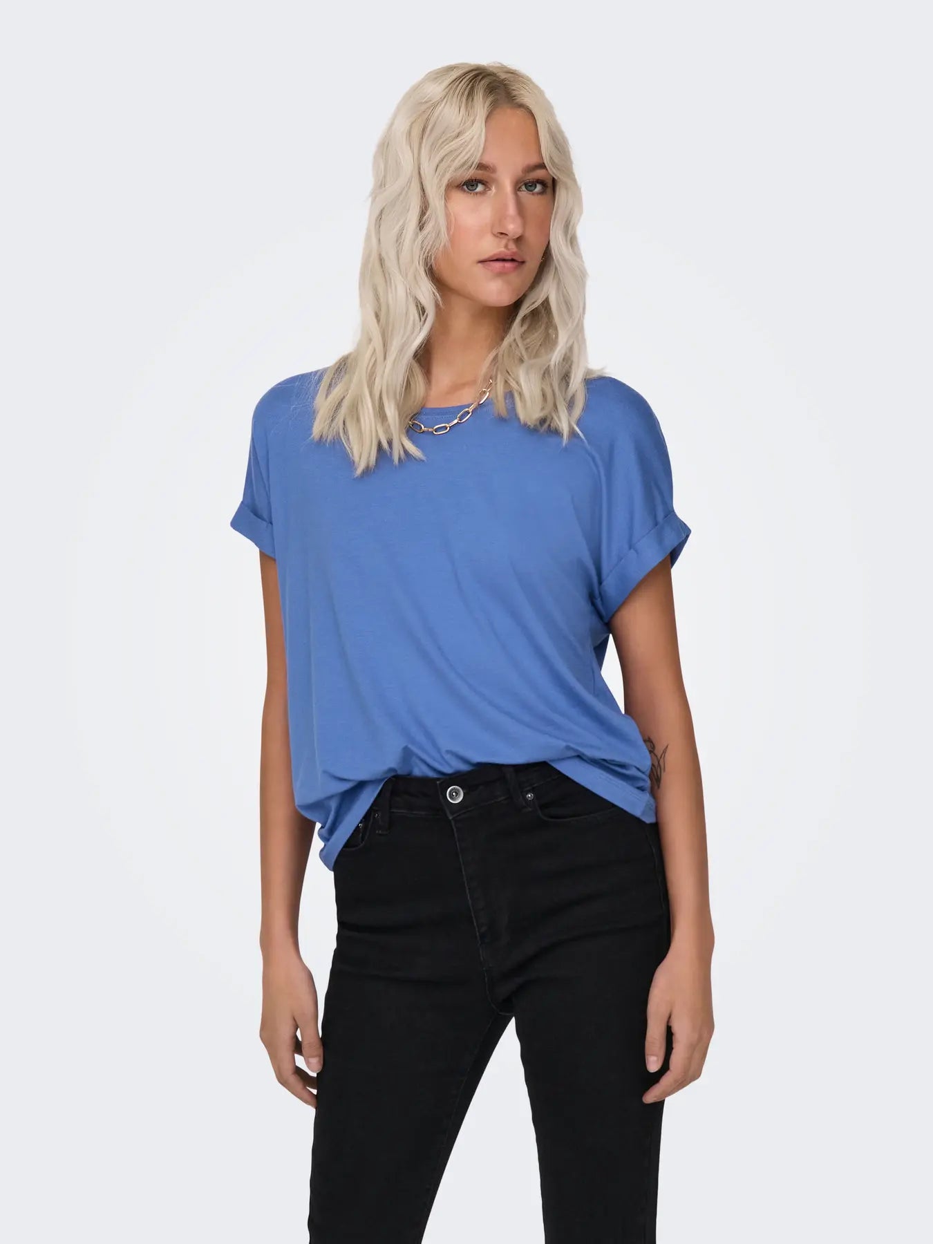 ONLY Moster Short Sleeve Crew Tee in blue by Only styled with black denim pants, minimalist modern top for casual wear