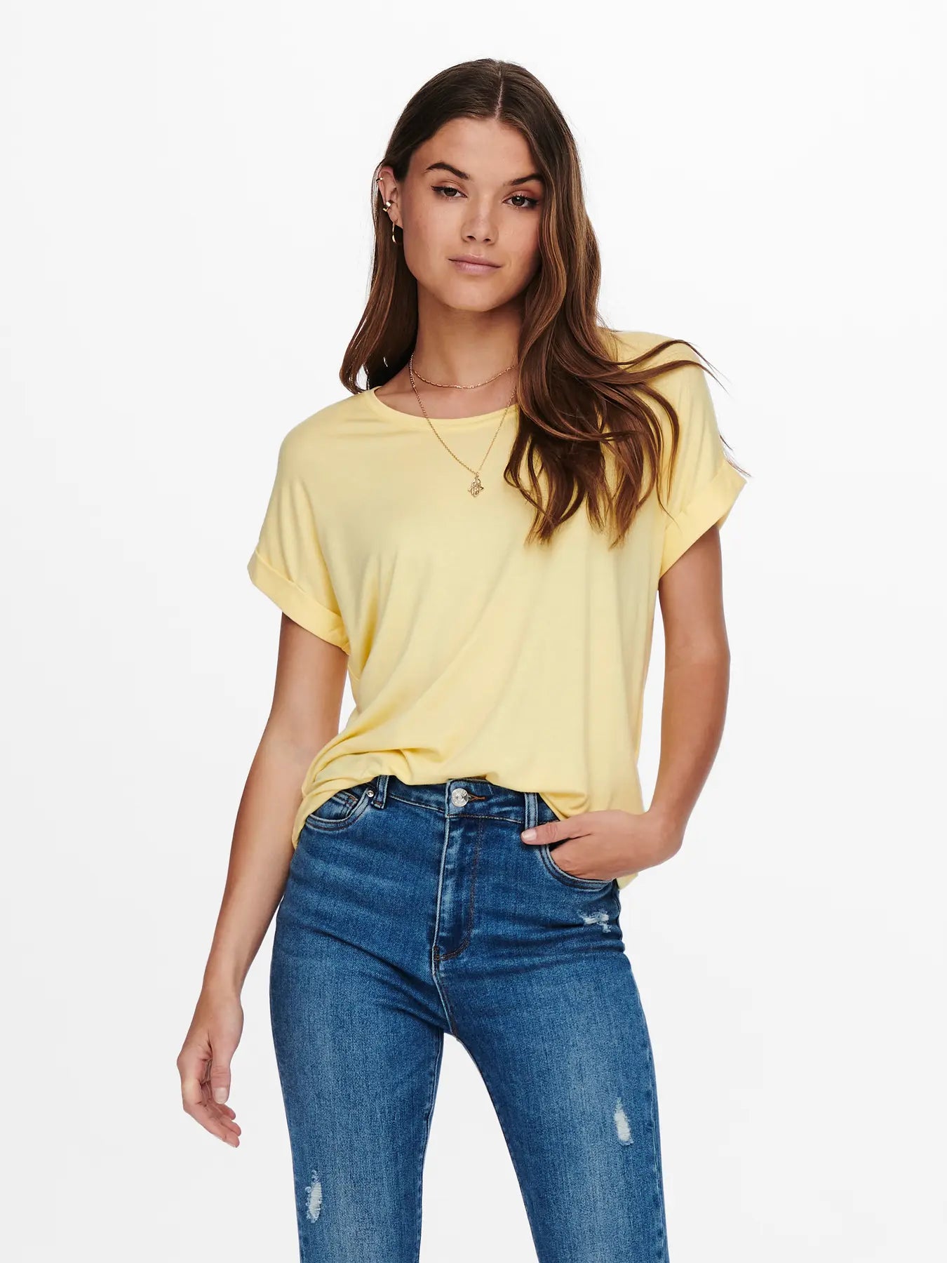 Yellow short sleeve crew tee named ONLY Moster Short Sleeve Crew Tee by Only, paired with blue denim jeans.