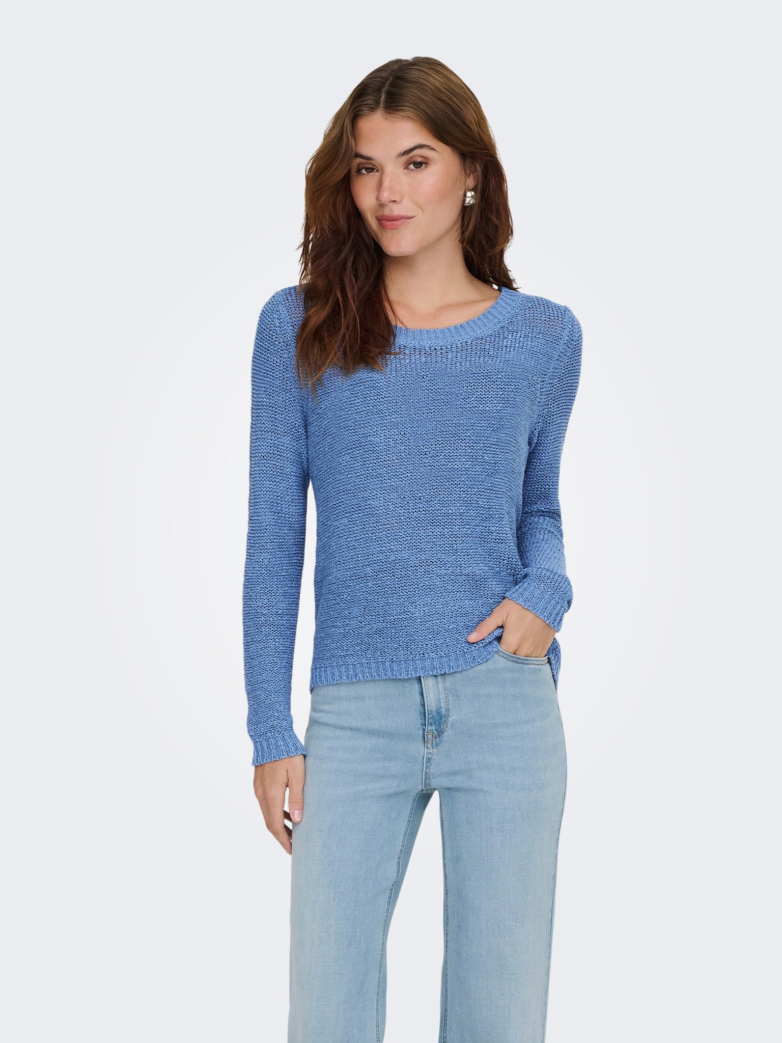 ONLY Geena Loose Knit Crew Sweater in blue by Only, styled with light denim jeans, casual feminine look with earrings