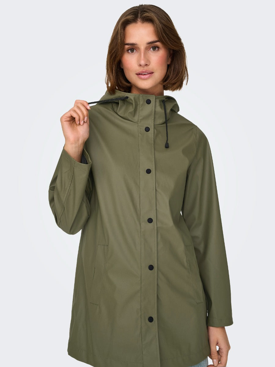 ONLY New Ellen Raincoat by Only in olive green with a hood and button closure, styled as outerwear coat.