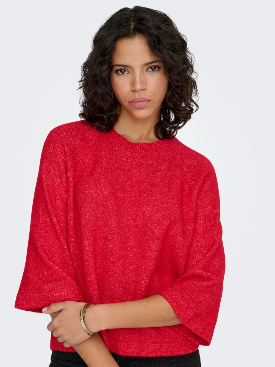 ONLY Simoni 3/4 Sleeve Sweater by Only in vibrant red, featuring a relaxed fit and soft fabric, ideal for casual wear.