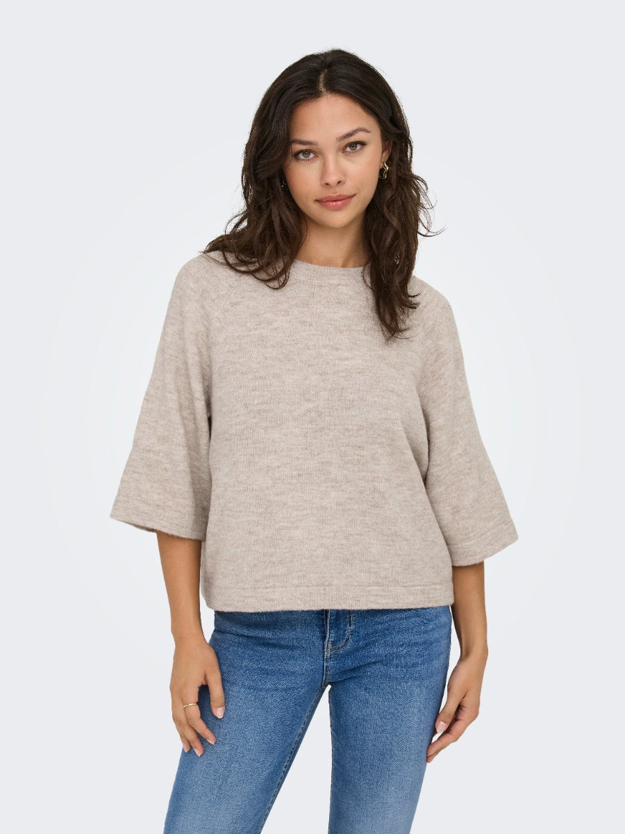 ONLY Simoni 3/4 Sleeve Sweater in taupe by Only, styled with casual blue denim jeans and gold earrings.