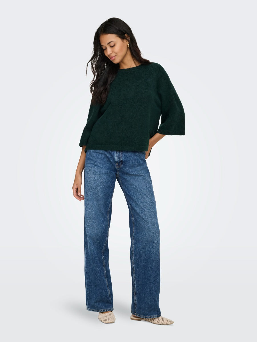 ONLY Simoni 3/4 Sleeve Sweater by Only in dark teal with wide sleeves styled with denim jeans and flats