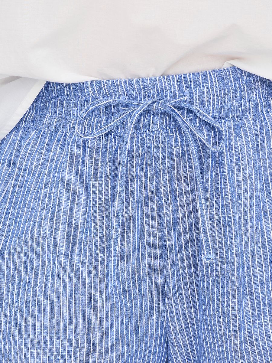 Close-up of blue striped Jacqueline De Yong Linen Shorts with elastic waist and drawstring detail by Jacqueline De Yong.