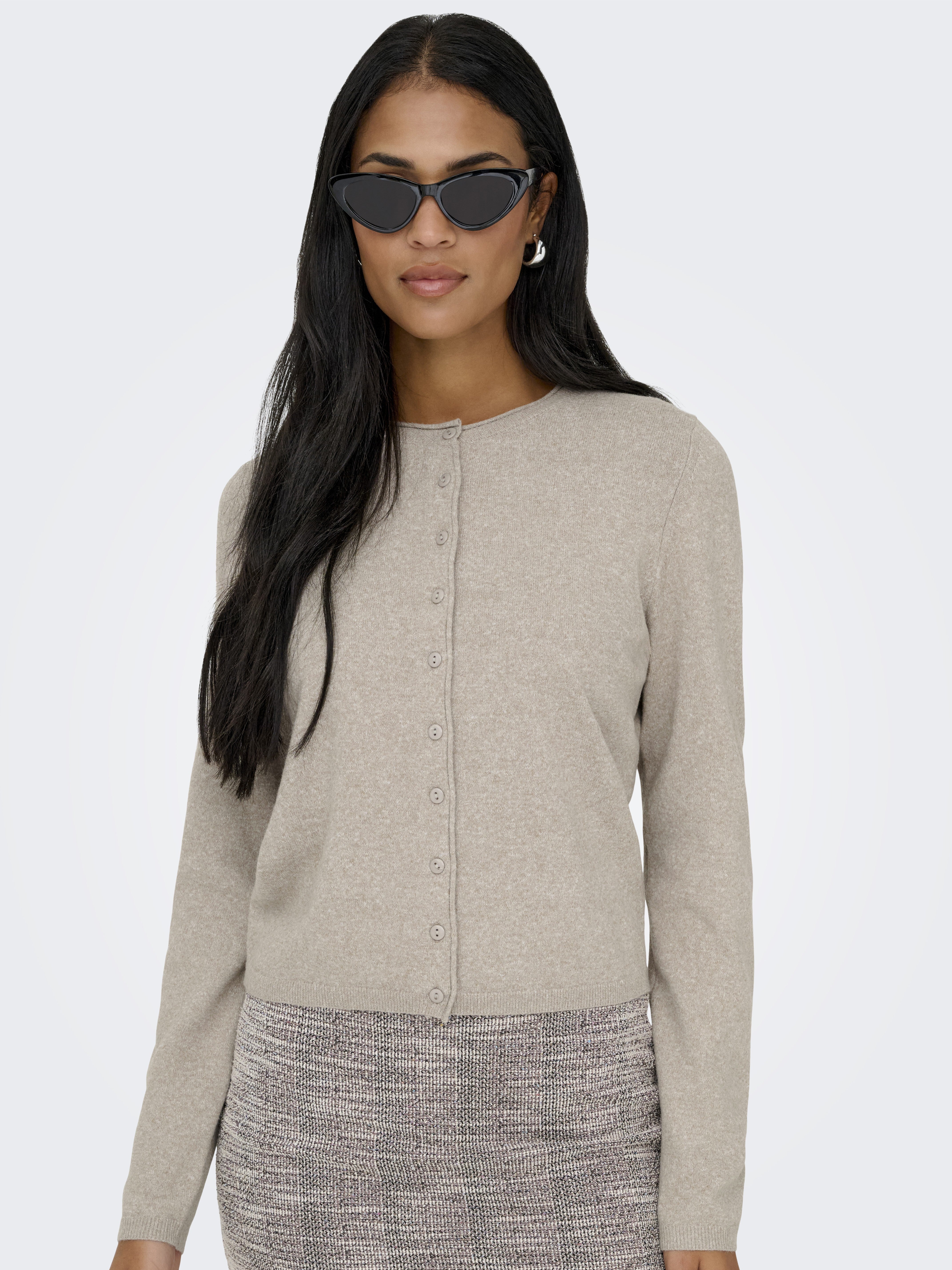 ONLY Loyal Life Button Front Knit Cardigan by Only in beige knit fabric with full button closure and long sleeves, styled with accessories.