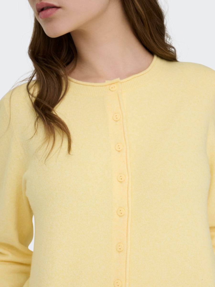 ONLY Loyal Life Button Front Knit Cardigan by Only in soft yellow, featuring a button-down front and knit fabric sweater design.