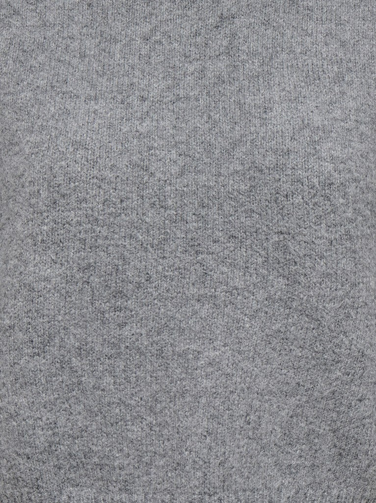 Close-up of gray textured fabric with a soft woven surface
