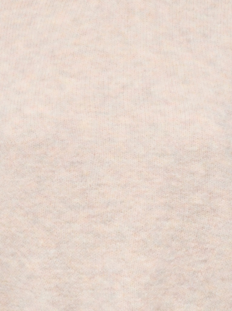 Close-up of soft pale pink and beige textured fabric