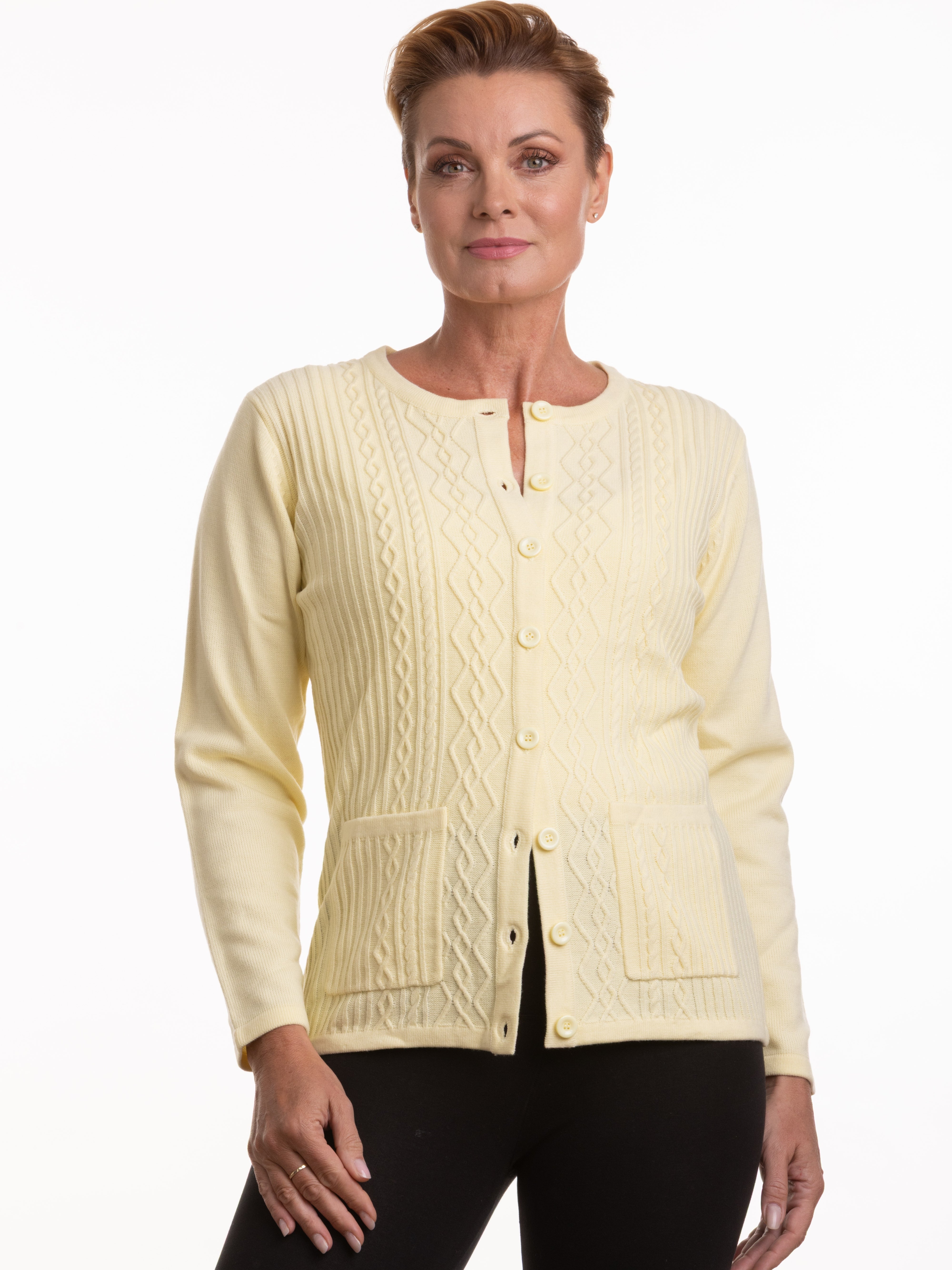 Chrissy Cable Knit Pocket Cardigan in soft yellow knit by Nulook Fashions, featuring buttons and front pockets.