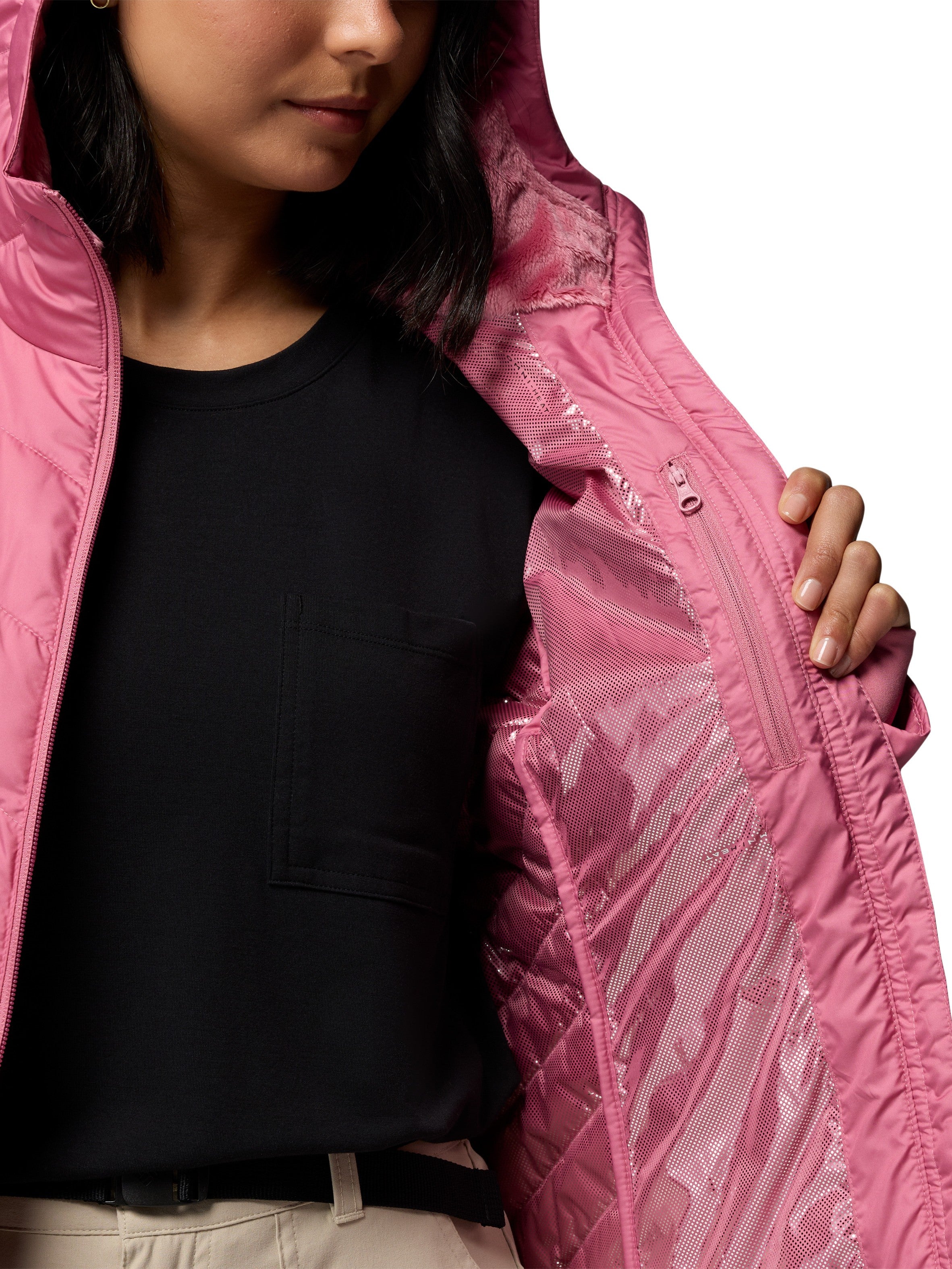 Columbia Heavenly Short Hooded Omni-Heat Jacket in rose pink showing reflective heat technology lining and zipper pocket.