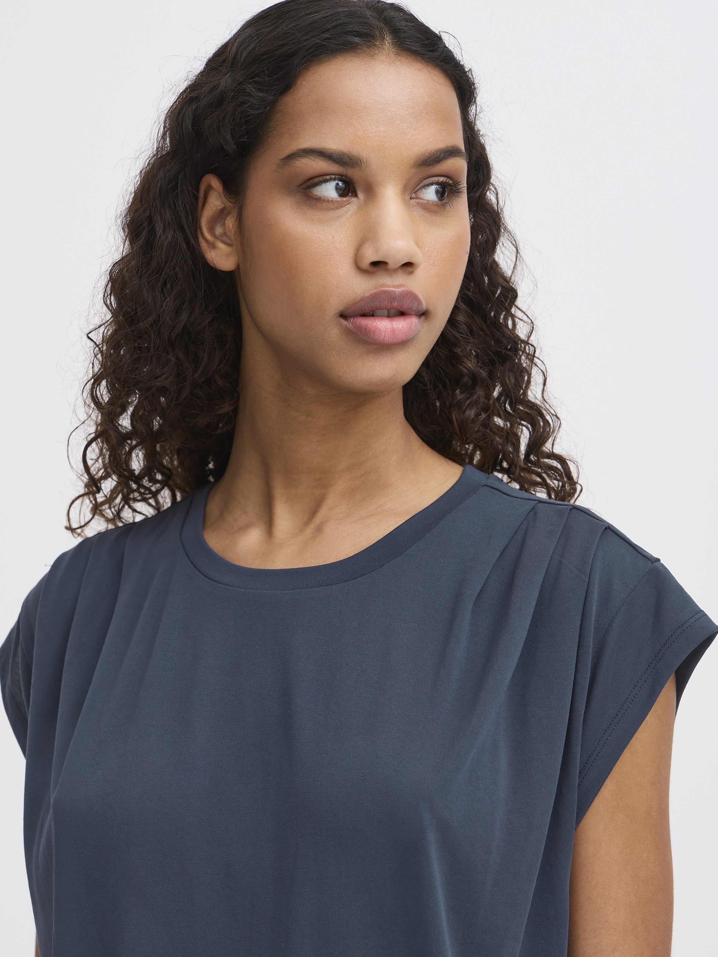 Close-up of a navy Ichi Lisken Top by Ichi with short sleeves and a round neckline