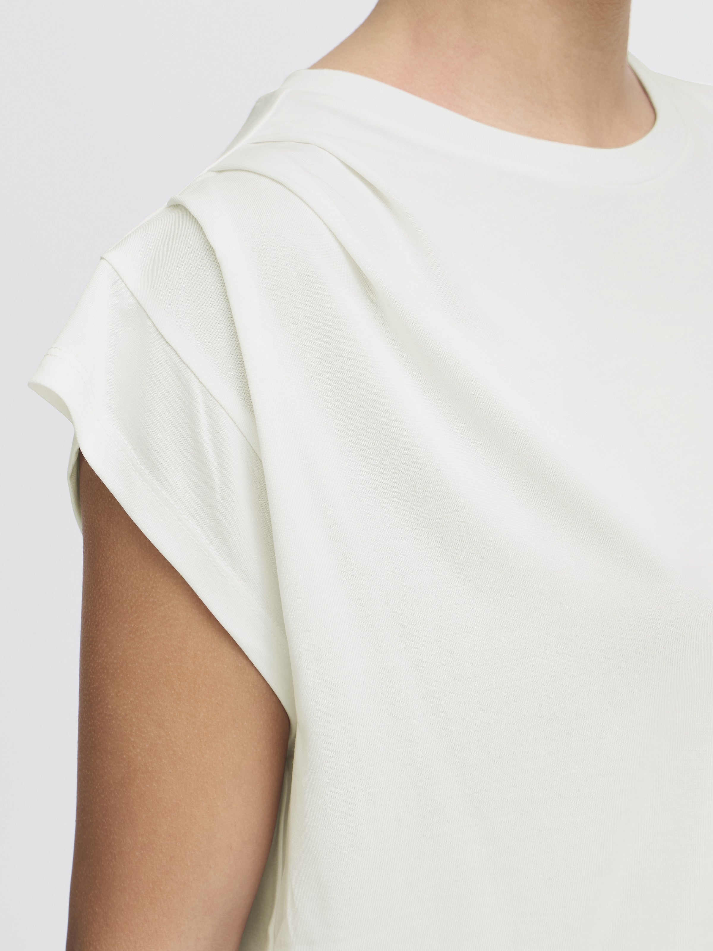 Close-up of white Ichi Lisken Top showing soft fabric and folded shoulder detail by Ichi.