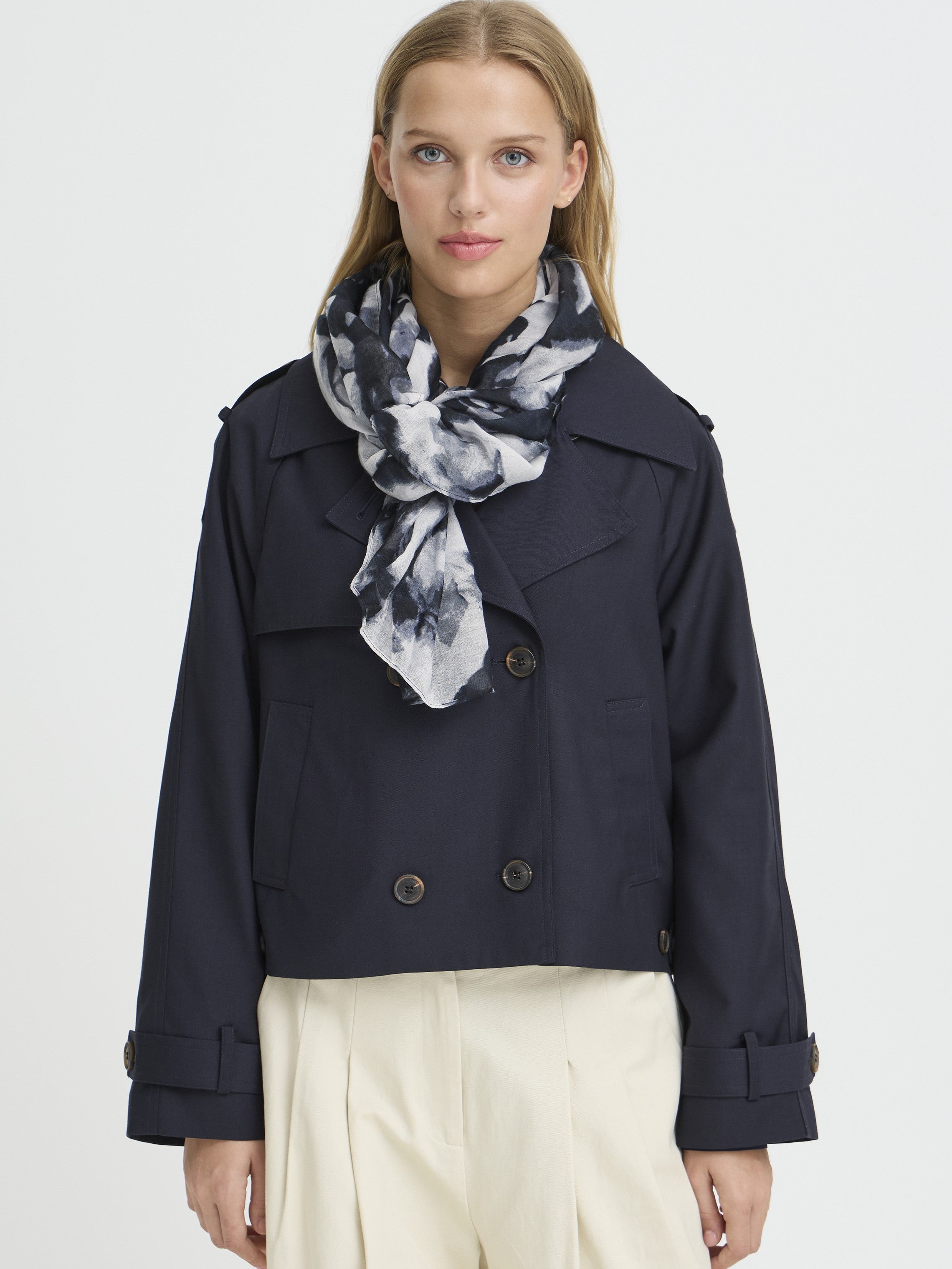 Light floral patterned Ichi Anita Floral Scarf styled with a navy jacket and cream trousers by Ichi.