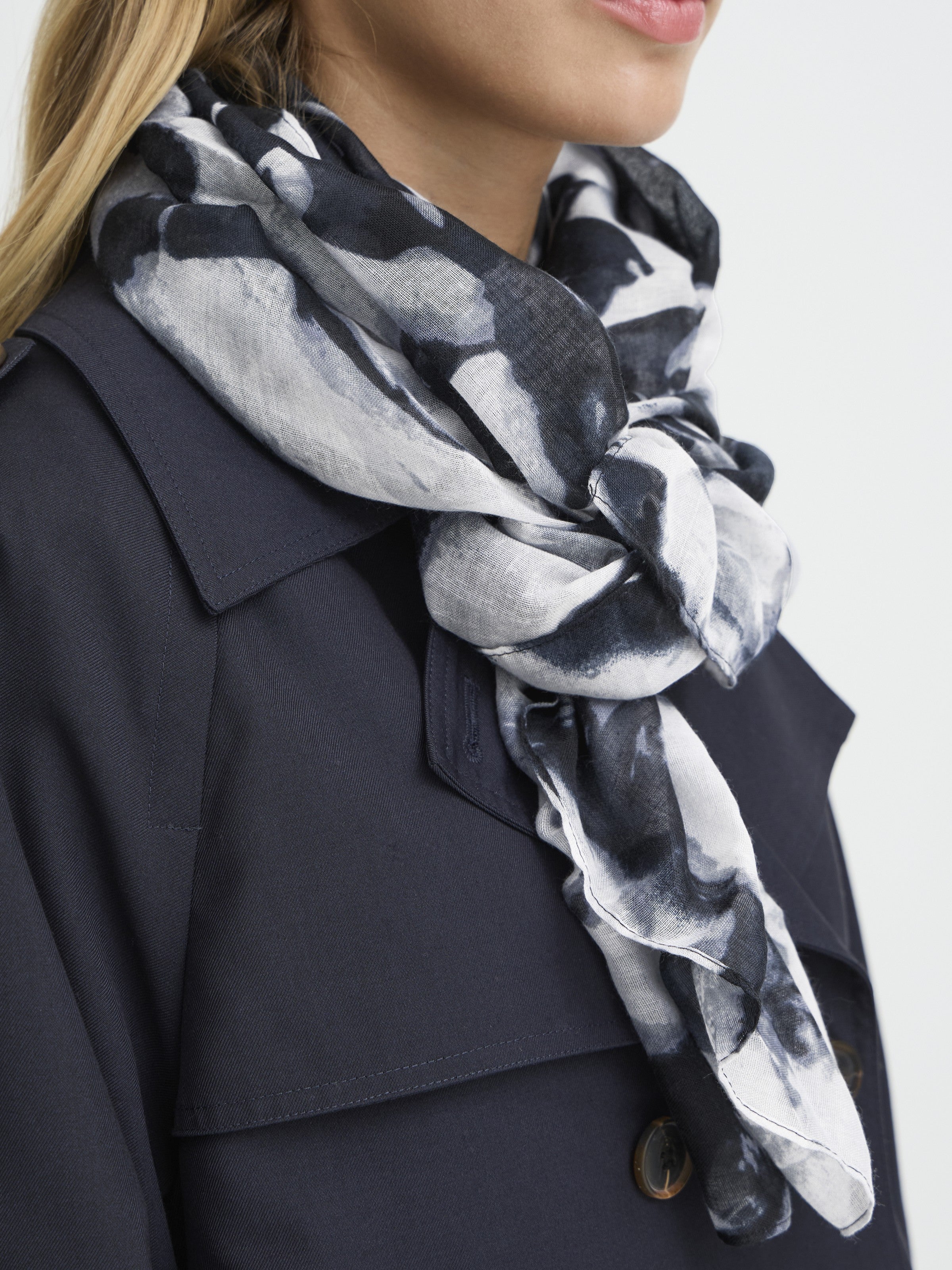 Ichi Anita Floral Scarf in black and white worn over a dark coat, elegant accessory by Ichi.