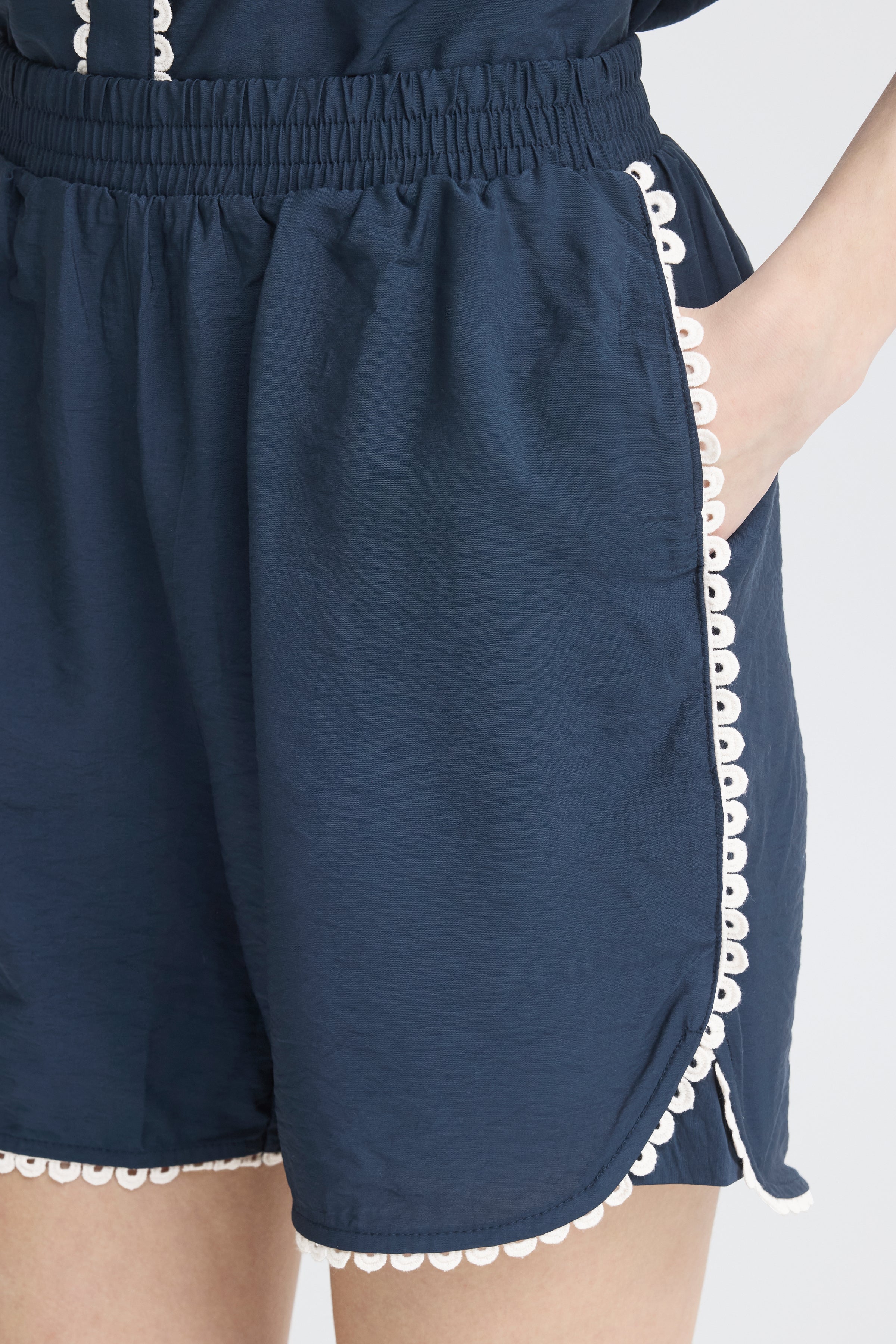 Ichi Leni Ladder Pull-On Shorts in navy with white lace trim detail by Ichi brand.