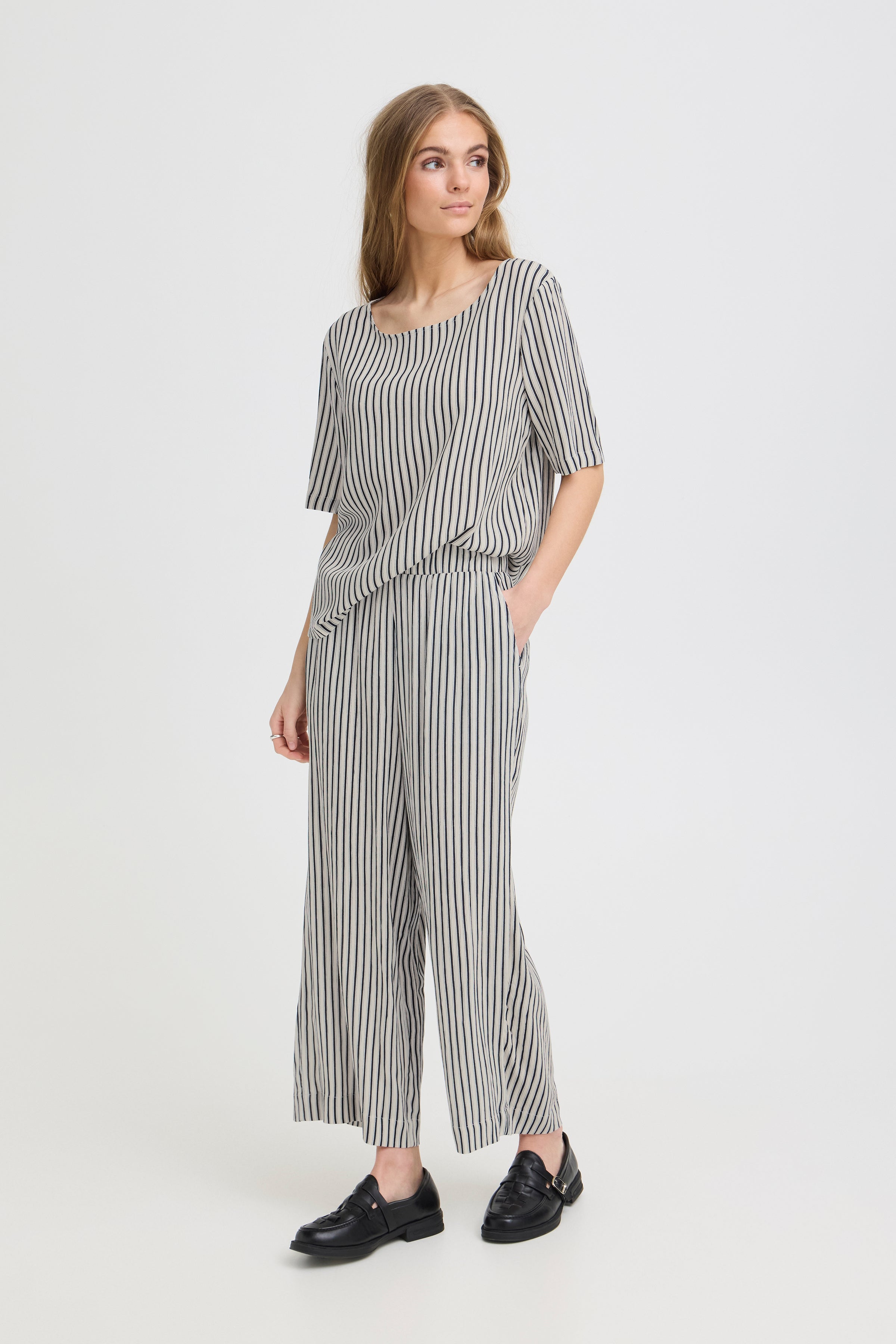 Ichi Marrakech Cropped Trousers in beige with black stripes styled with a matching top and black loafers