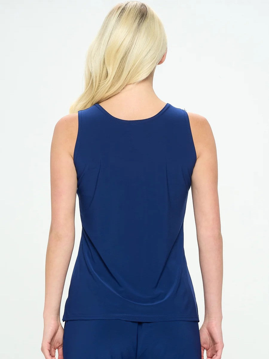 Back view of a navy blue sleeveless top with a loose draped fit and blonde hair visible above the neckline