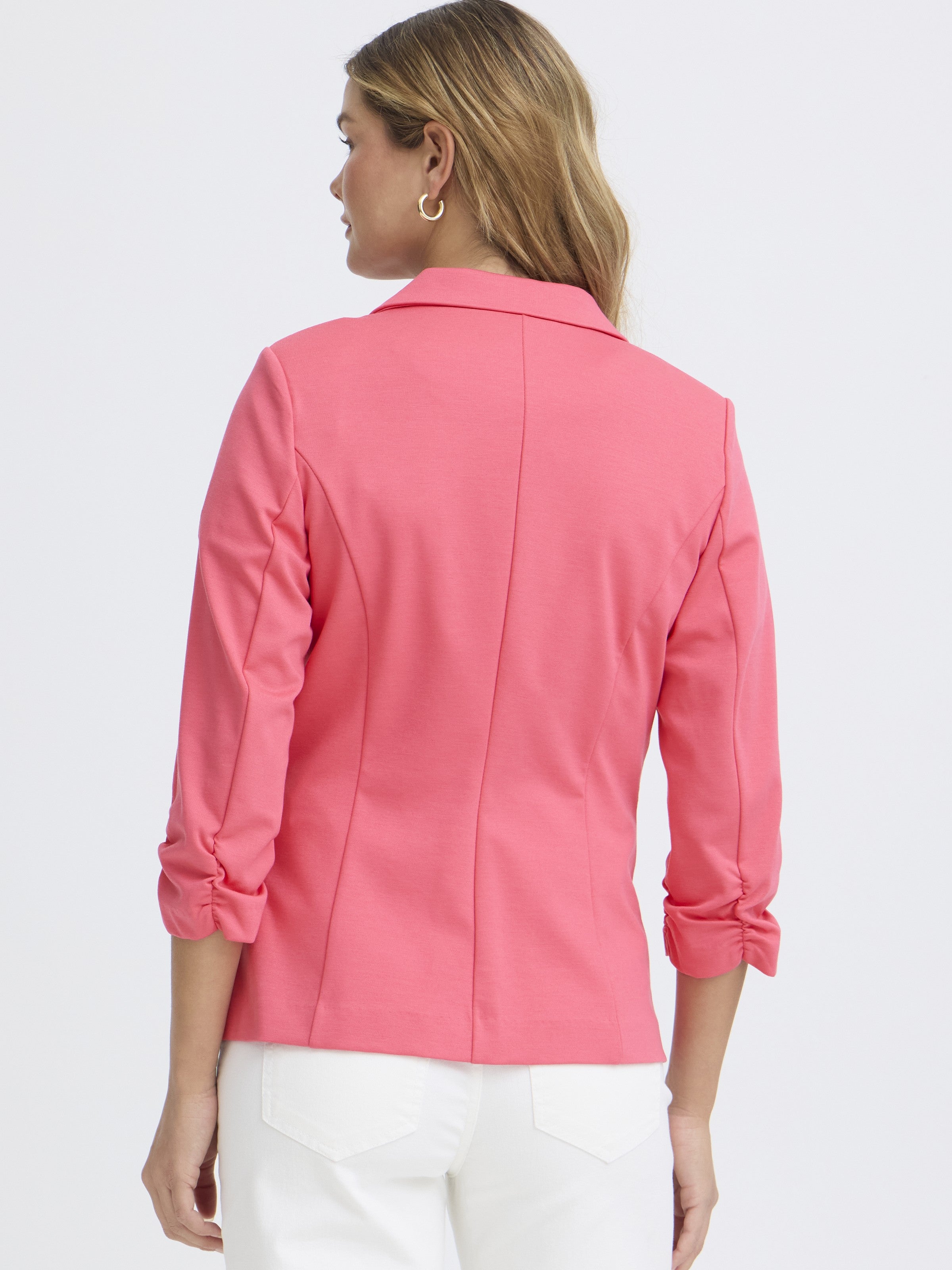 Back view of a pink Fransa Gathered Sleeve Stretch Blazer with ruched sleeves, paired with white pants.