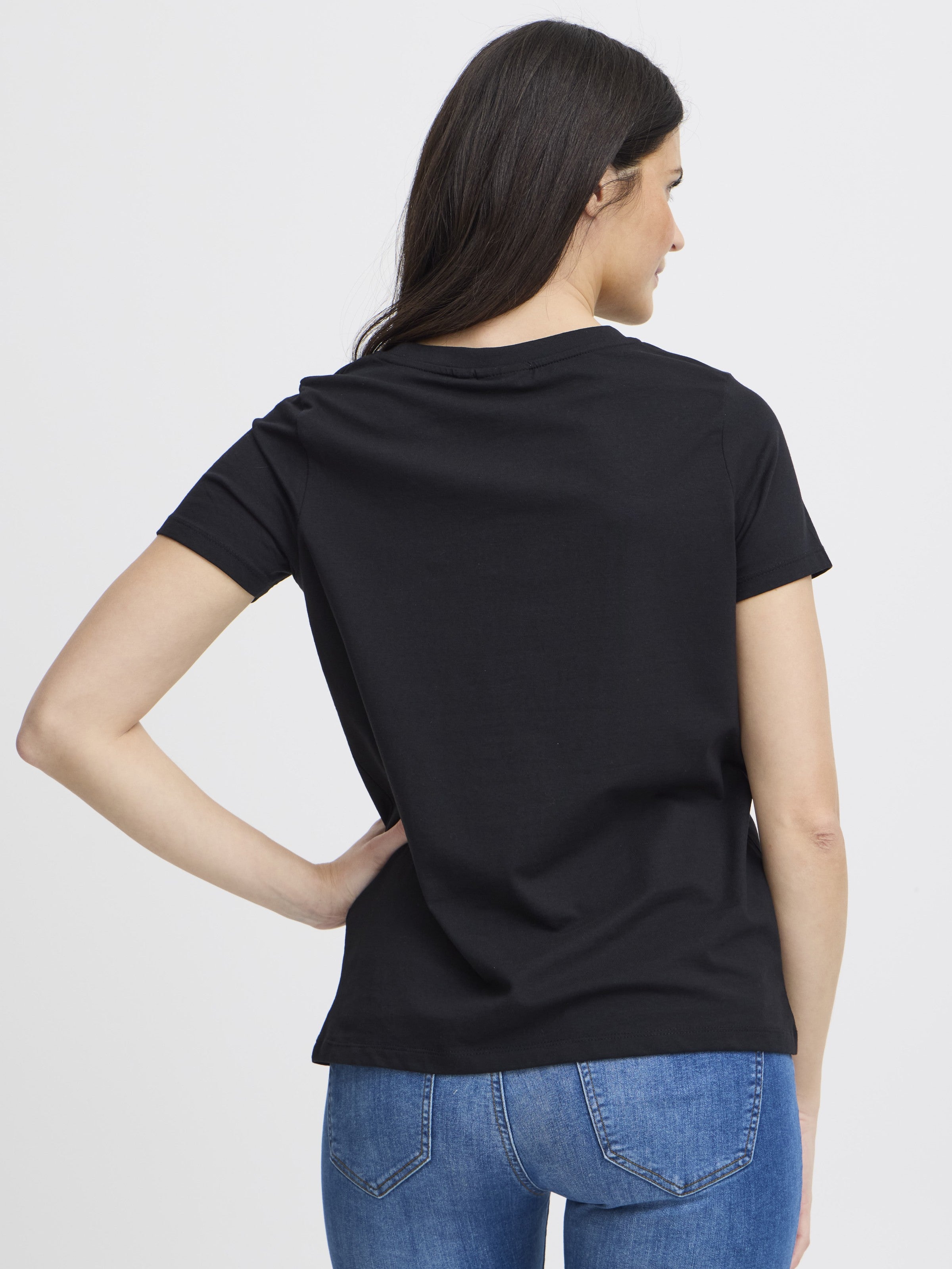 Back view of a black Fransa Shoulder Detail Short Sleeve Crew Neck T-Shirt paired with blue denim jeans