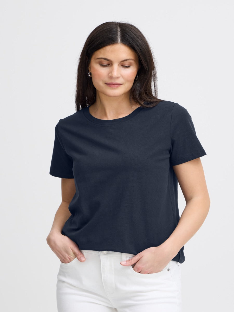 Navy top featuring Fransa Shoulder Detail Short Sleeve Crew Neck T-Shirt paired with white pants, from Fransa collection.