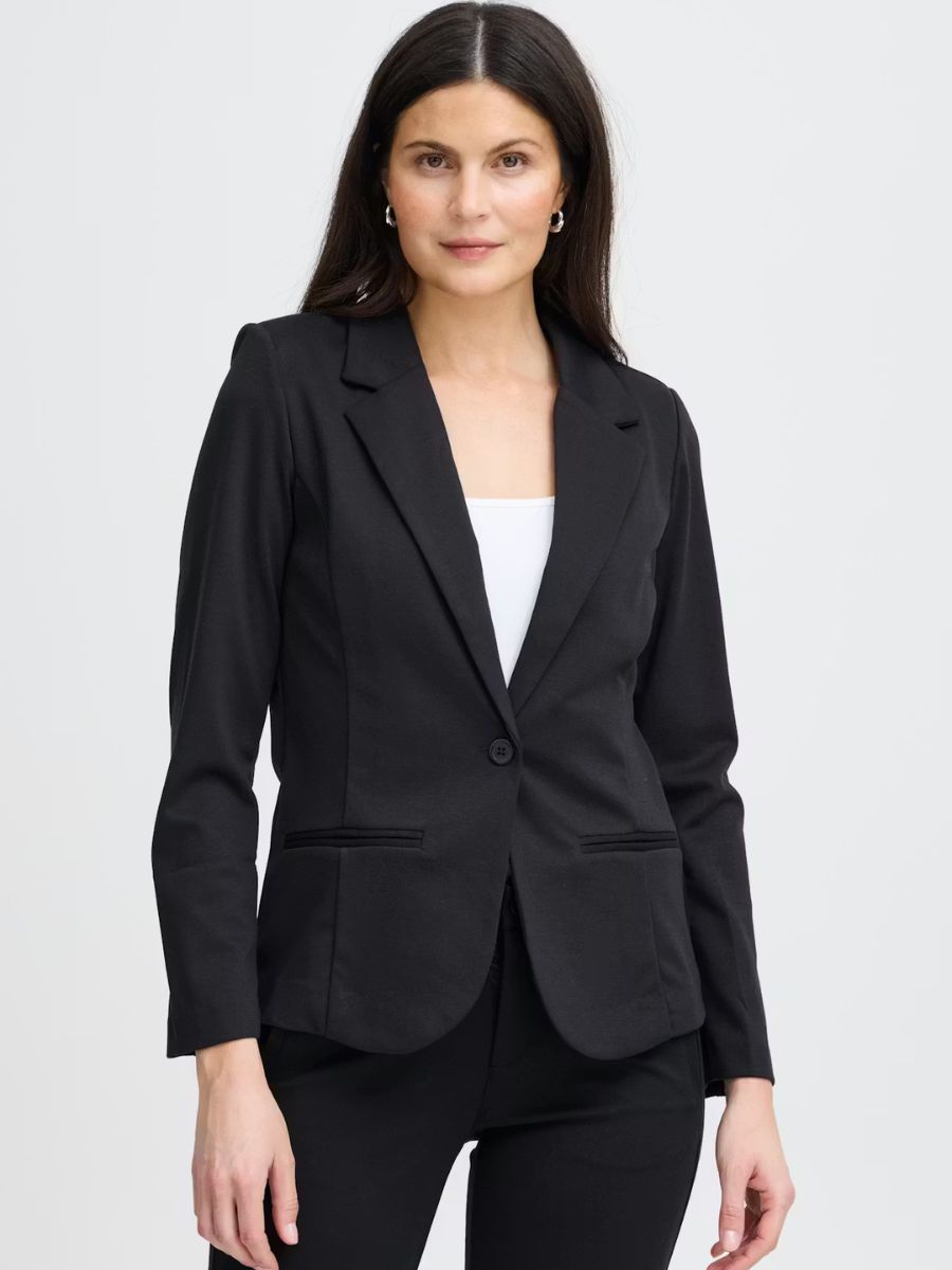 Fransa Jenns 1-Button Blazer in black tailored style, classic lapel, paired with black trousers and white top.