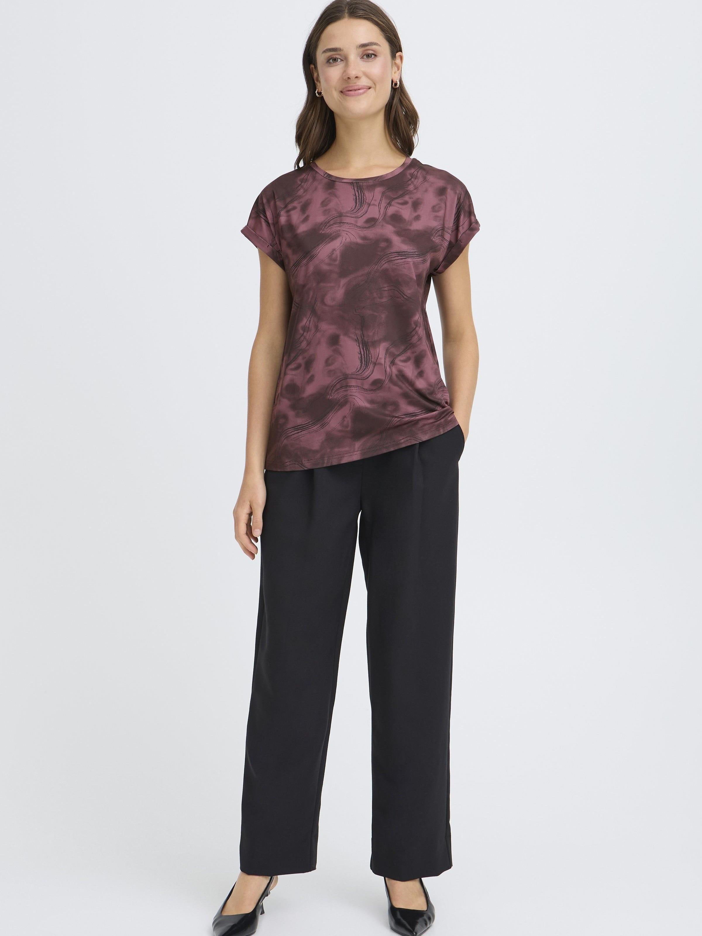 Fransa Seen Short Sleeve Crew Neck Top in burgundy with patterned fabric styled with black trousers and heels