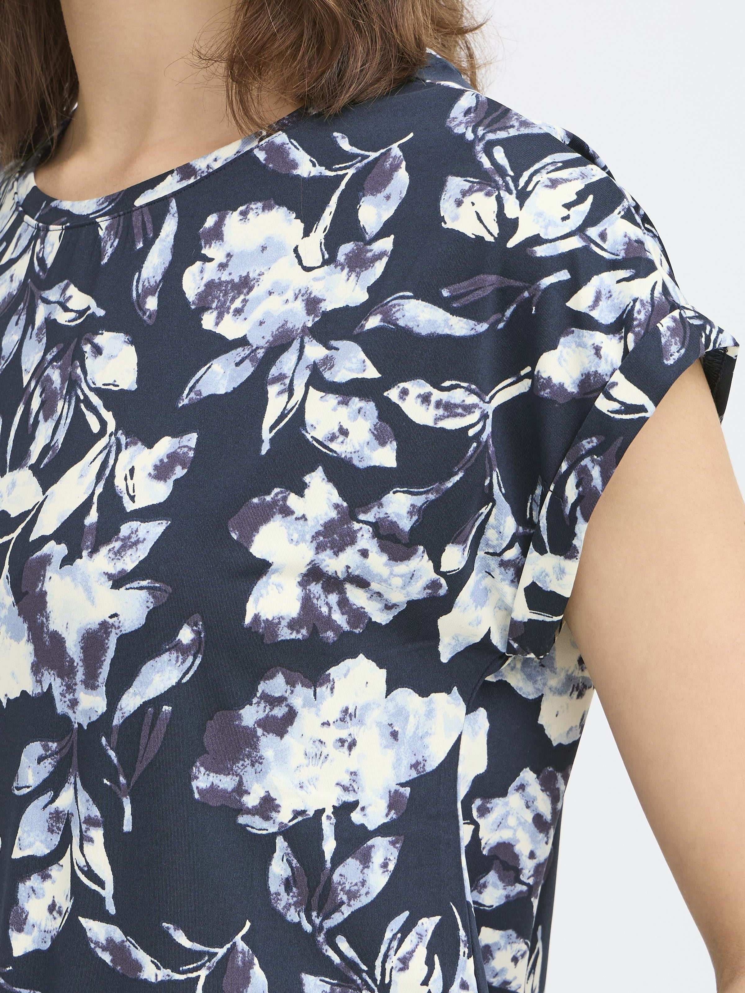 Close-up of navy floral print Fransa Seen Short Sleeve Crew Neck Top with soft fabric texture by Fransa