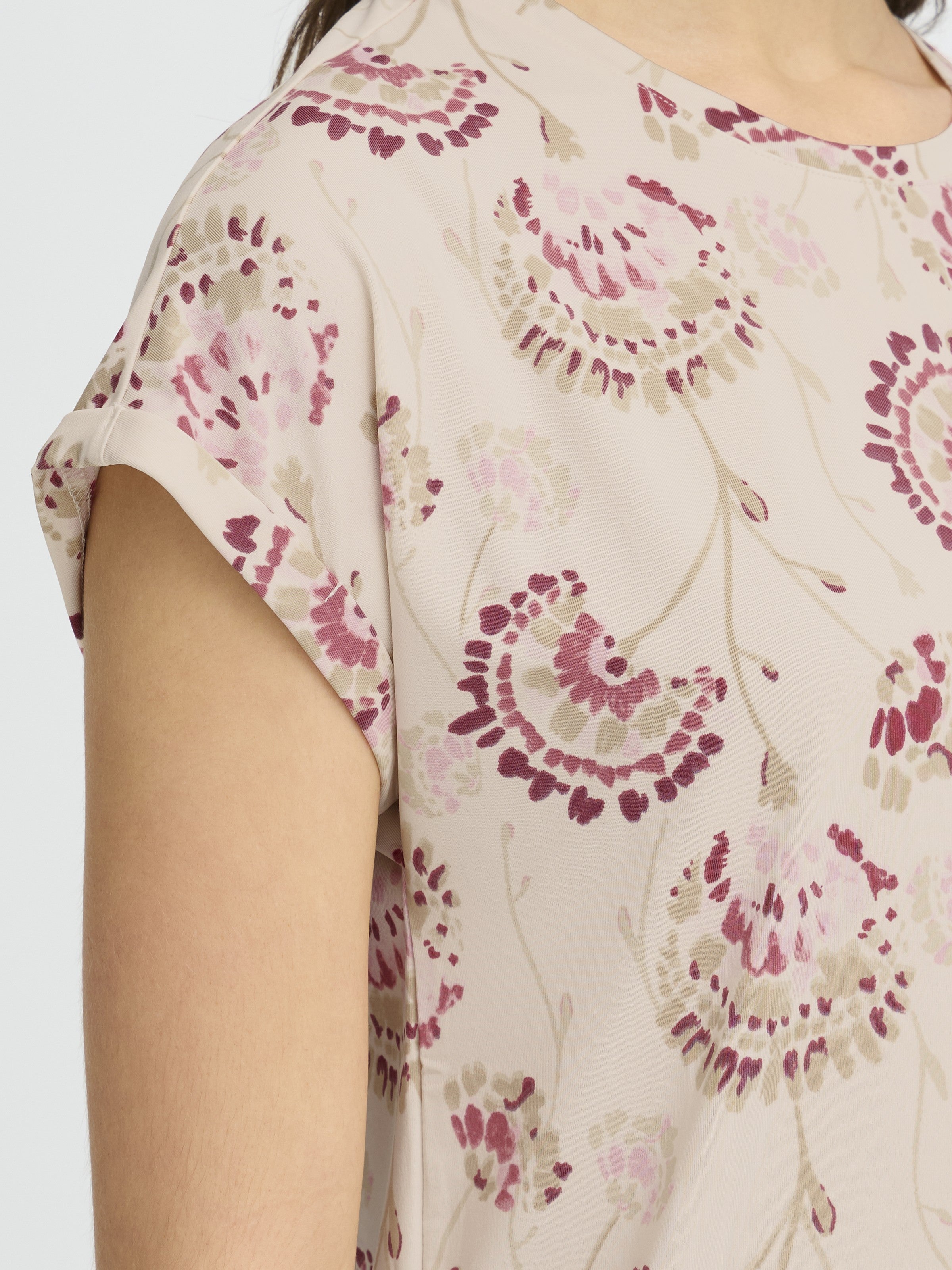 Fransa Seen Short Sleeve Crew Neck Top in soft off-white with pink and beige floral pattern detail.