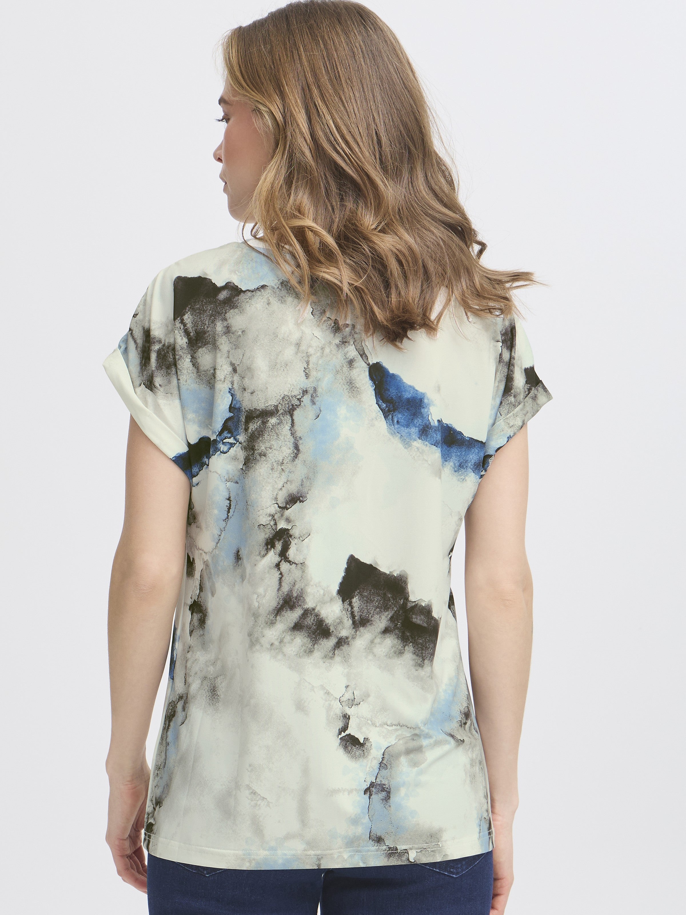 Fransa Seen Short Sleeve Crew Neck Top with abstract black and blue watercolor print on light background