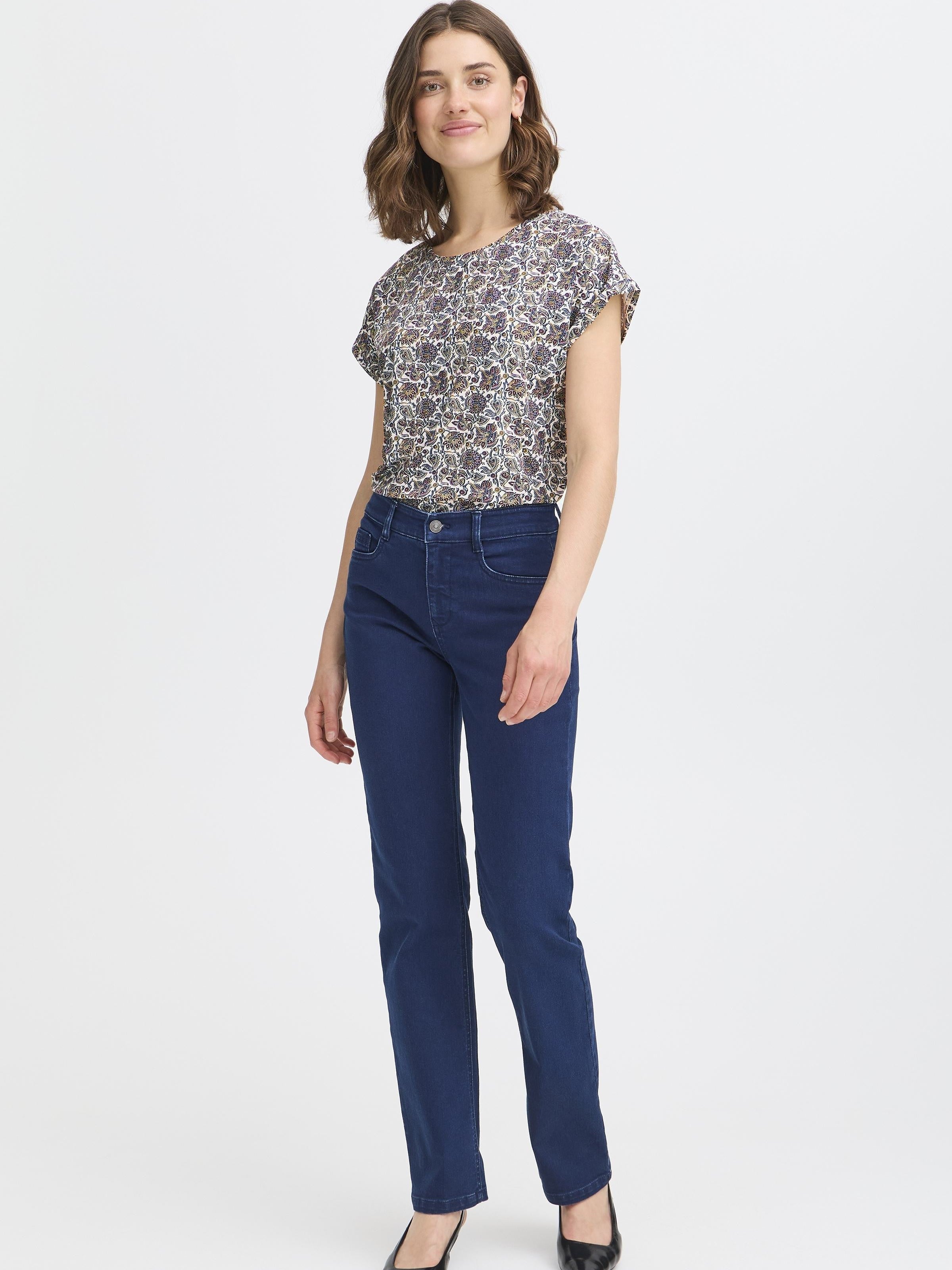 Fransa Seen Short Sleeve Crew Neck Top modeled with casual dark denim jeans, showcasing a floral pattern design.