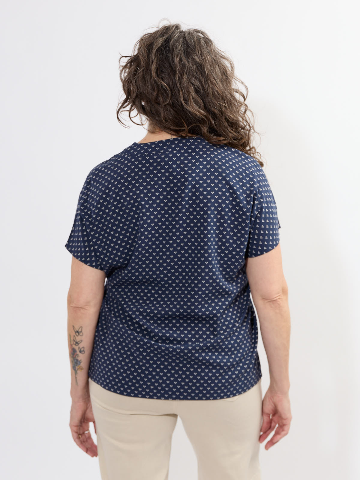 Fransa Justine Heart Print Short Sleeve V-Neck Top in navy with all-over heart pattern and relaxed fit back view
