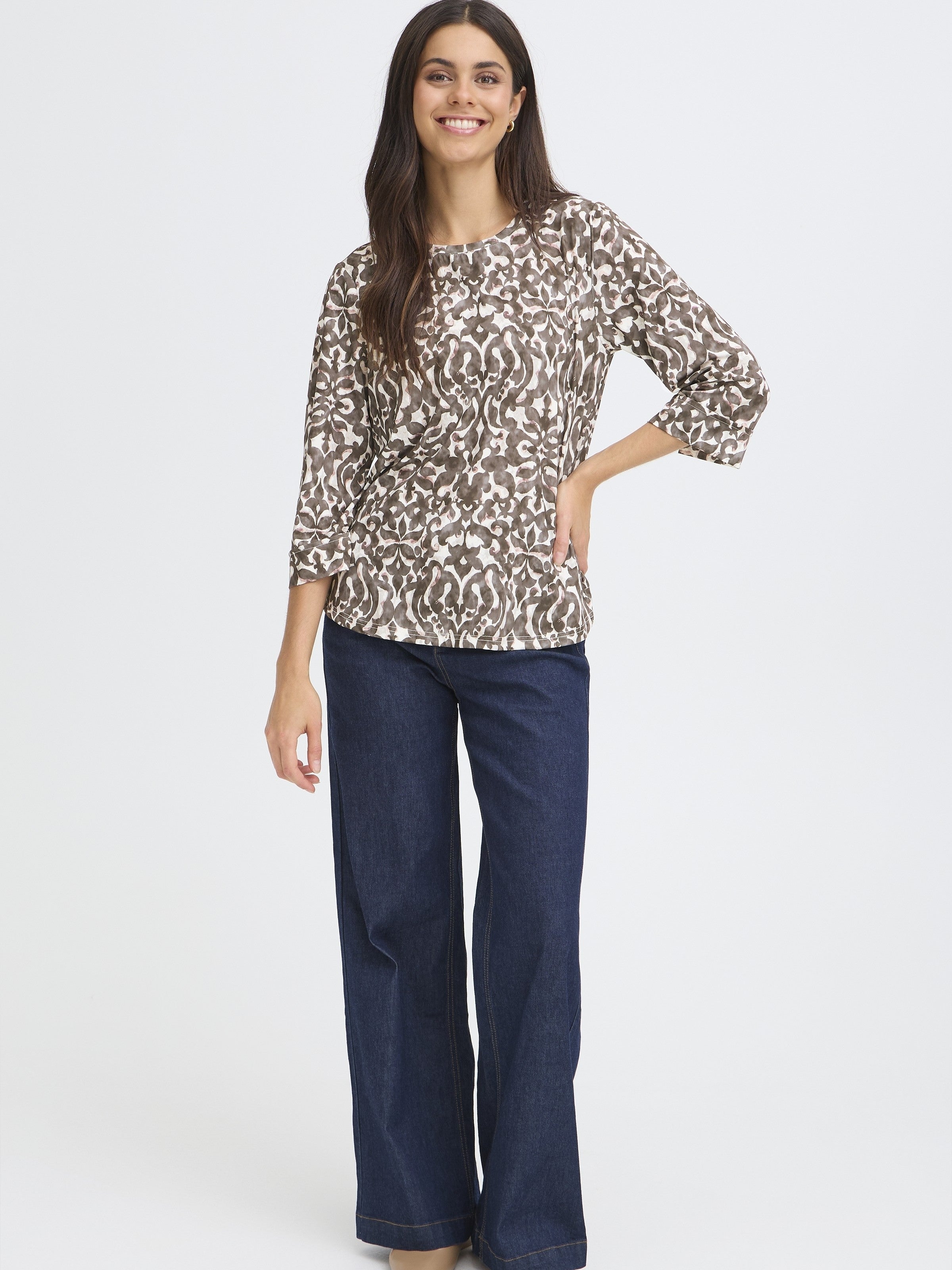 Fransa Seen Three-Quarter Sleeve Cuff Top in a brown and cream abstract pattern styled with dark denim jeans by Fransa