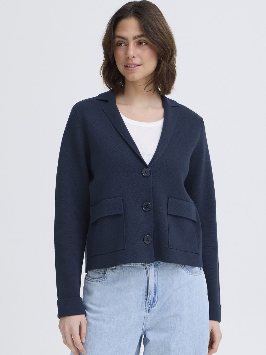 Fransa Frita Three-Button Pocket Cardigan in navy blue by Fransa, styled with light denim jeans and white top