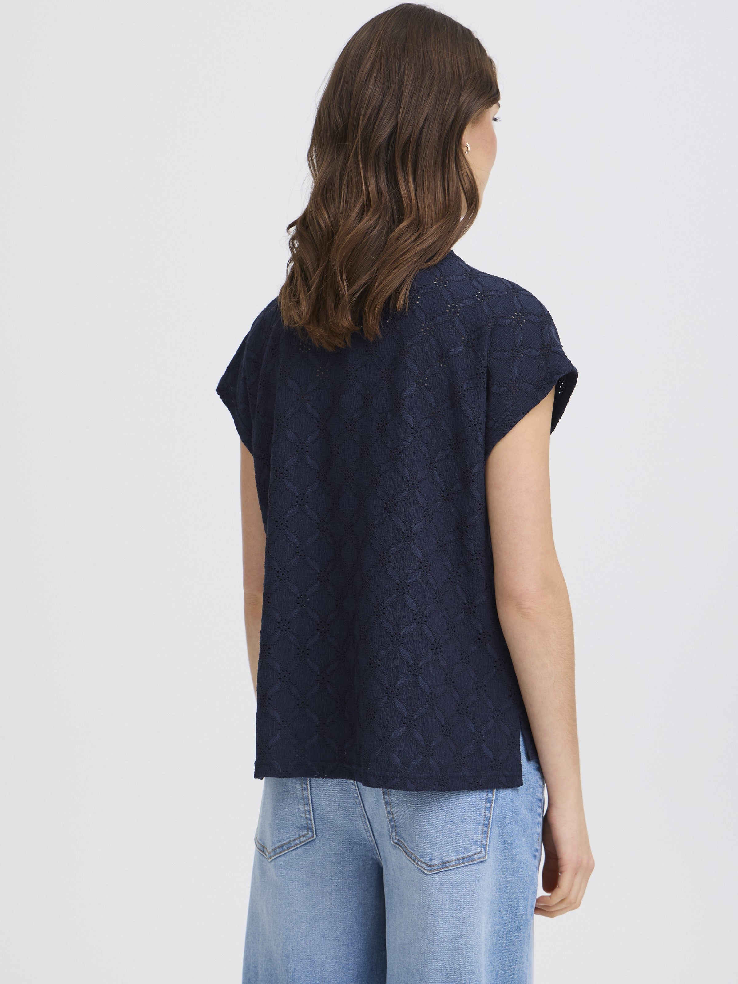 Back view of Fransa Mira Eyelet Stretch Short Sleeve Top in navy blue eyelet fabric with short sleeves by Fransa.