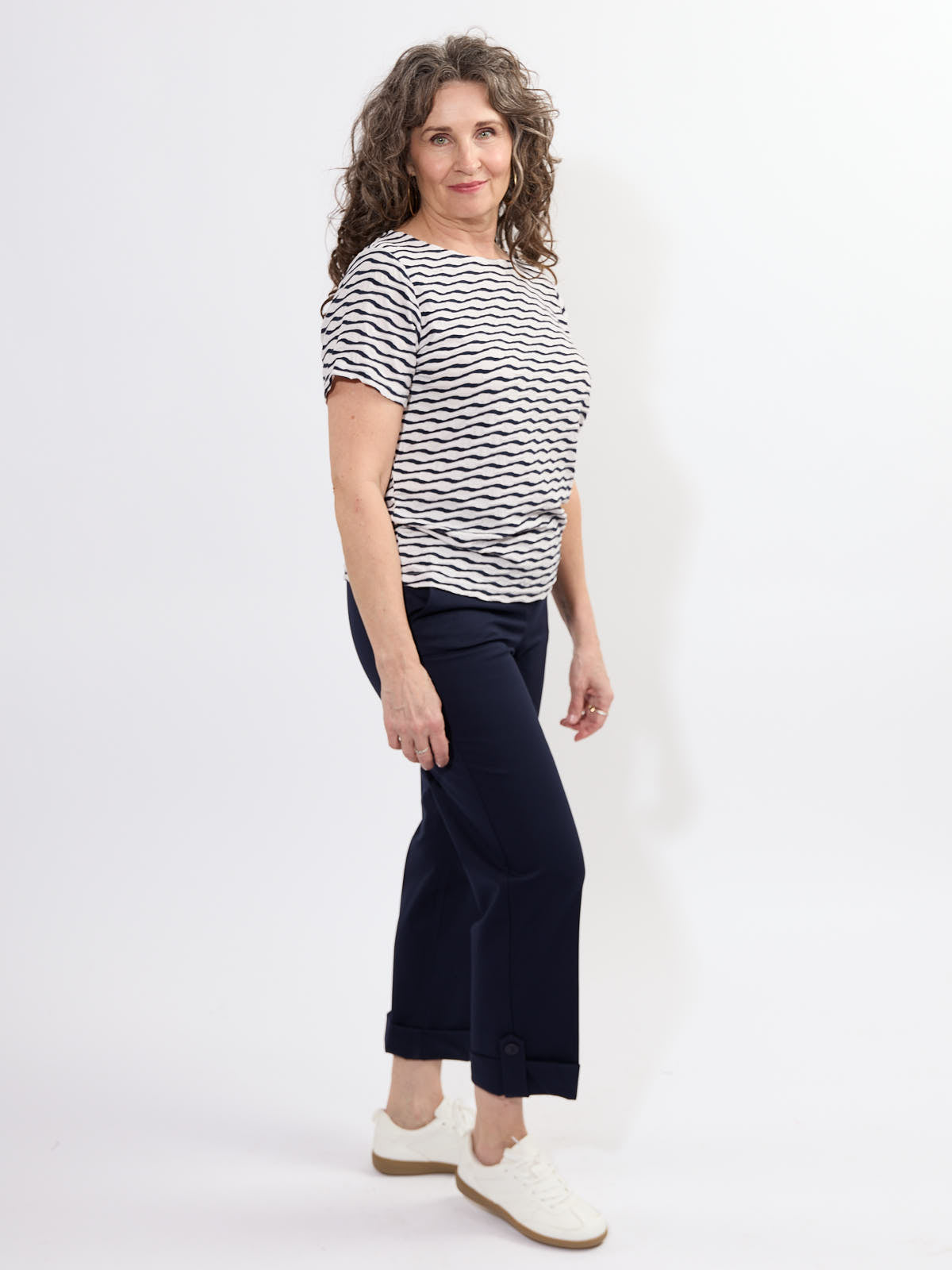Fransa Niamy Textured Wave Short Sleeve Top in navy and white, styled with navy pants and white sneakers by Fransa.